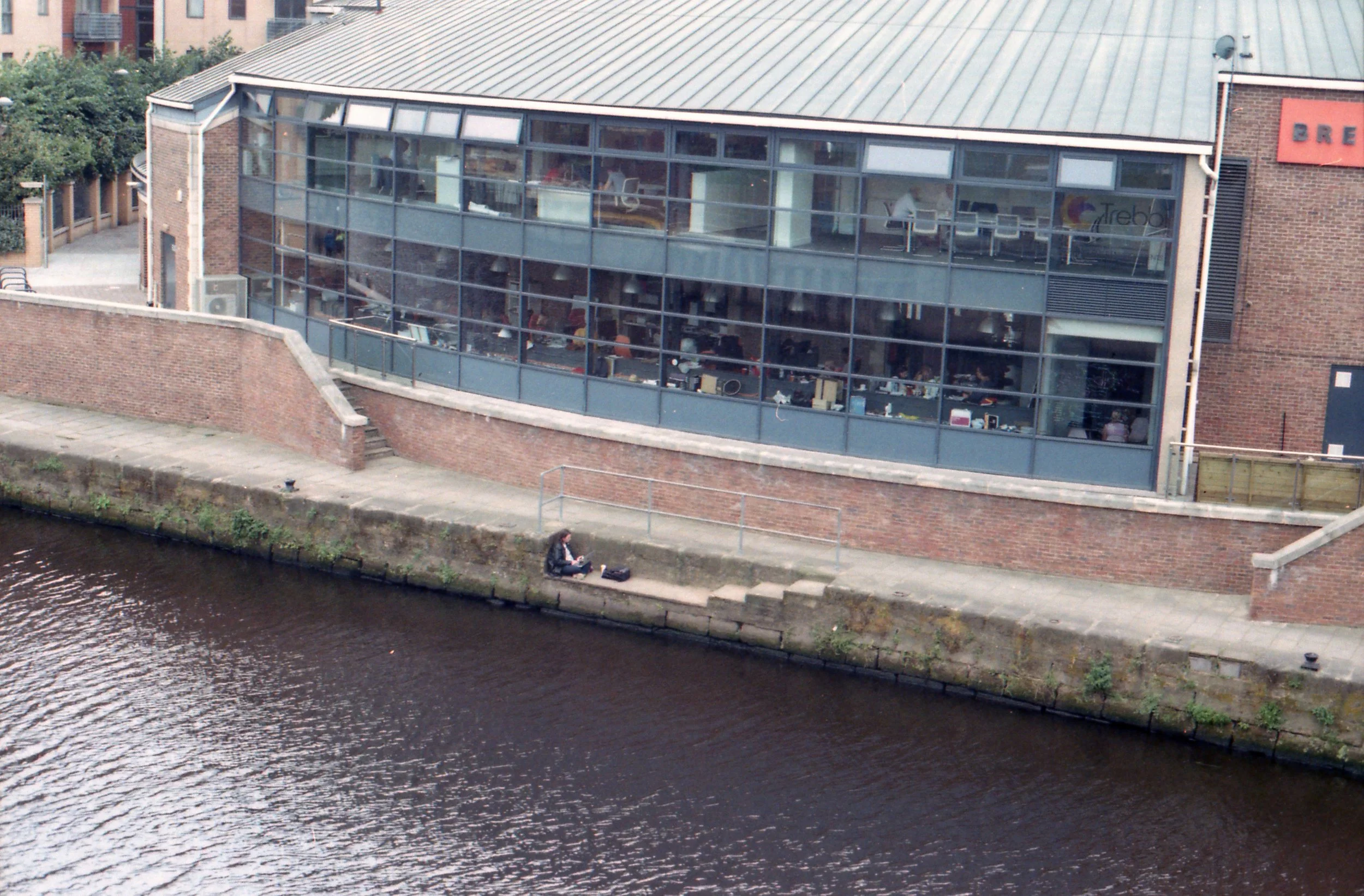 231/366 - I love how the view outside of my work window is always a bit different - this day I saw a man working/hiding on the stairs with his laptop.