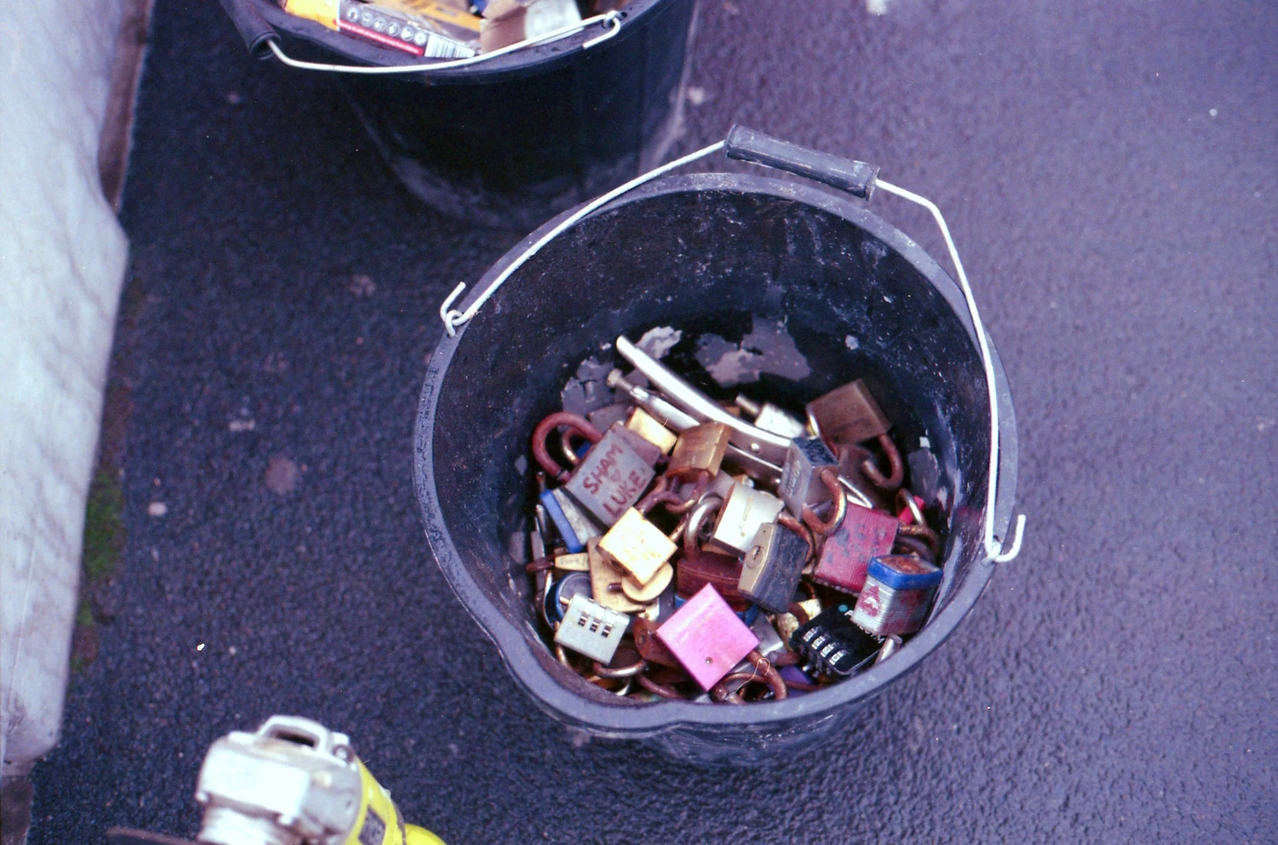 281/366 - Remember number 5 and number 120 of this project? Well all the keypads on the bridge across the canal in Leeds have now been removed and the guy removing them was nice enough to say yes to me taking a photo of them all in his bucket. Its a little bit sad to see them all together like that isn't it?