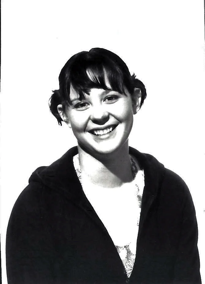 I don’t know when this is from. It’s possibly from when I took photography in high school. I’m not sure who took this. Possibly Kathleen or Jess. I don’t recall sitting for it. There’s also a slim chance its older than that, possibly from when my brother or sister were in high school, but I feel like I look too old for it to be from then.