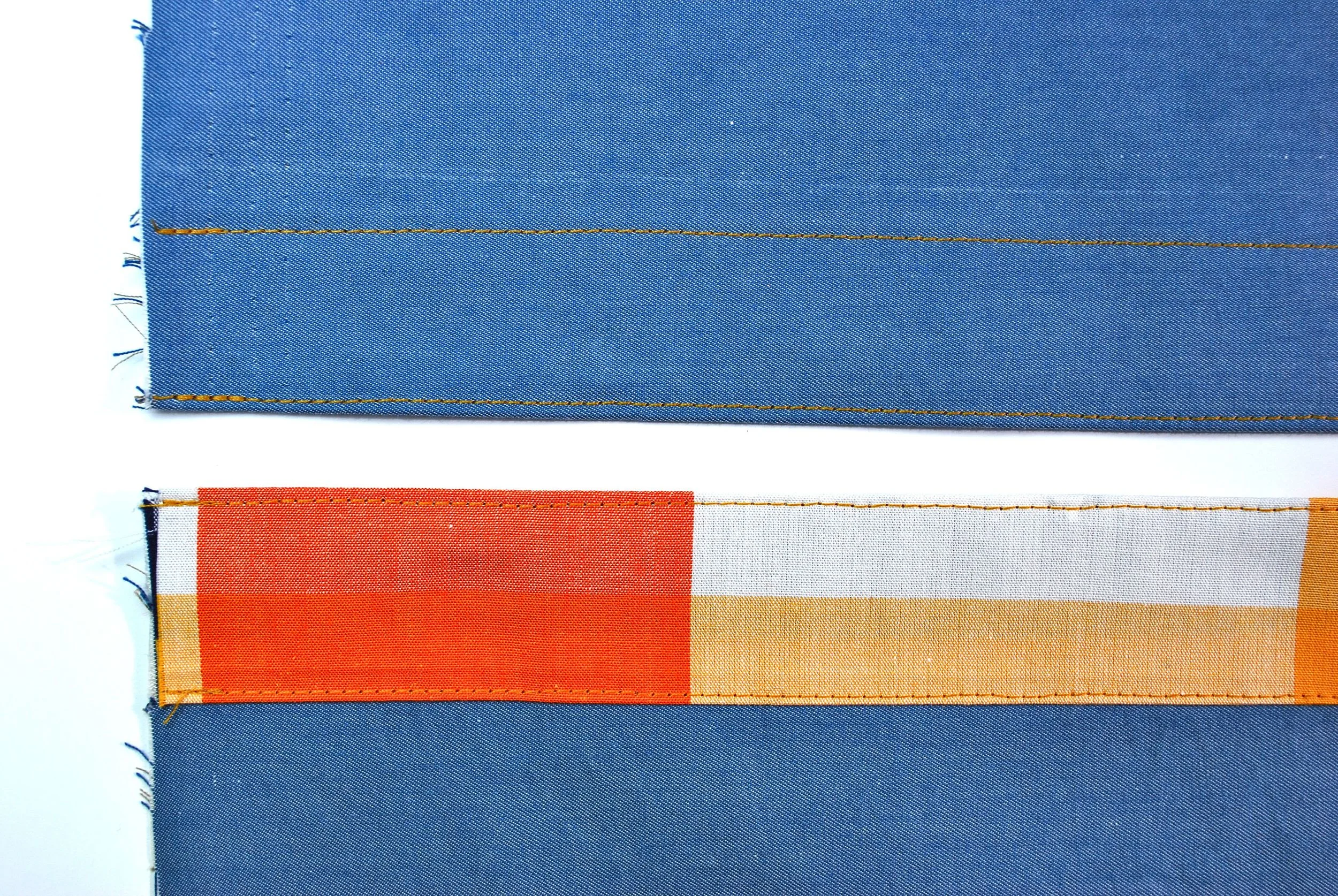 Both button plackets edgestitched. 