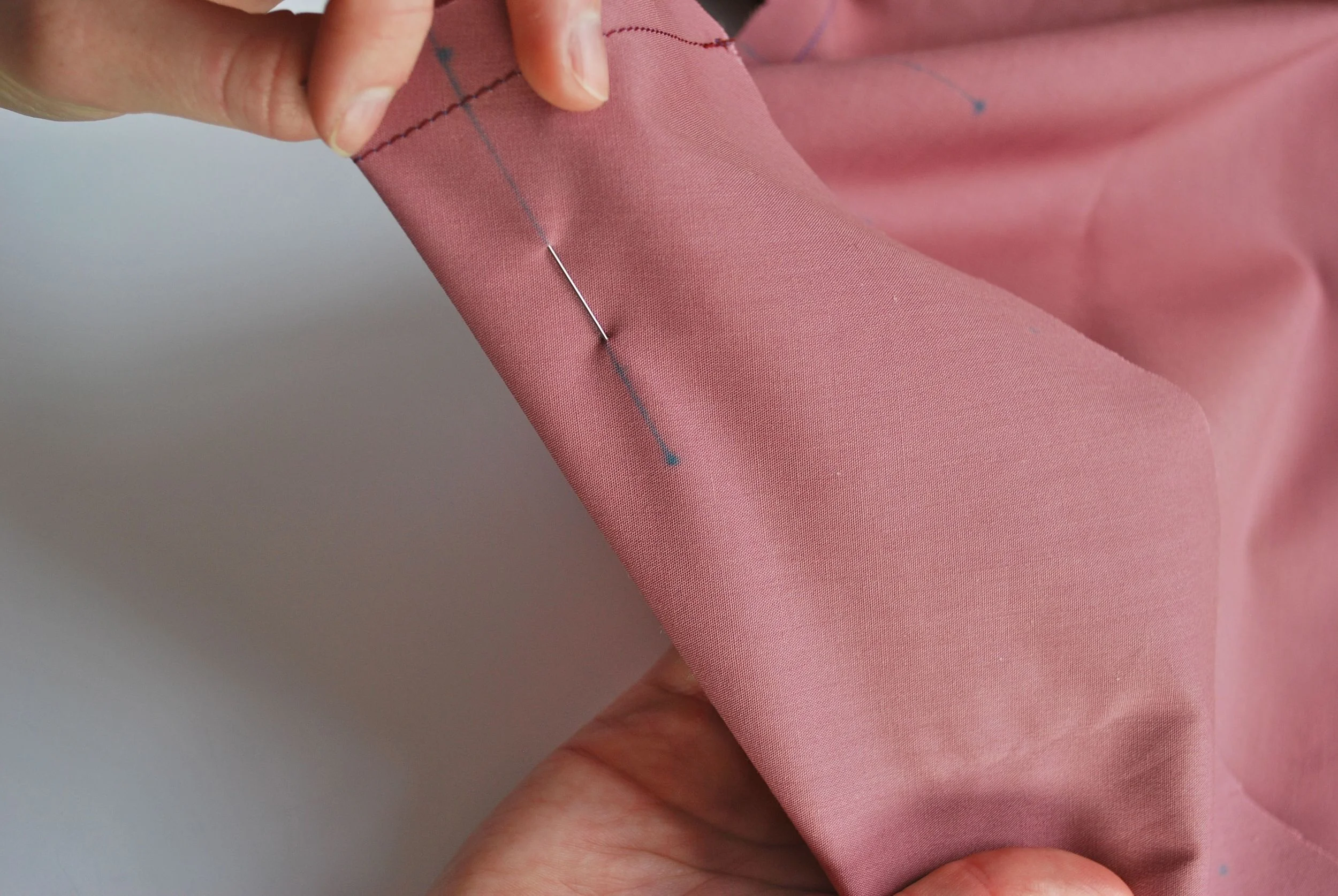 4. Check that the pin aligns nicely with the pleat lines.