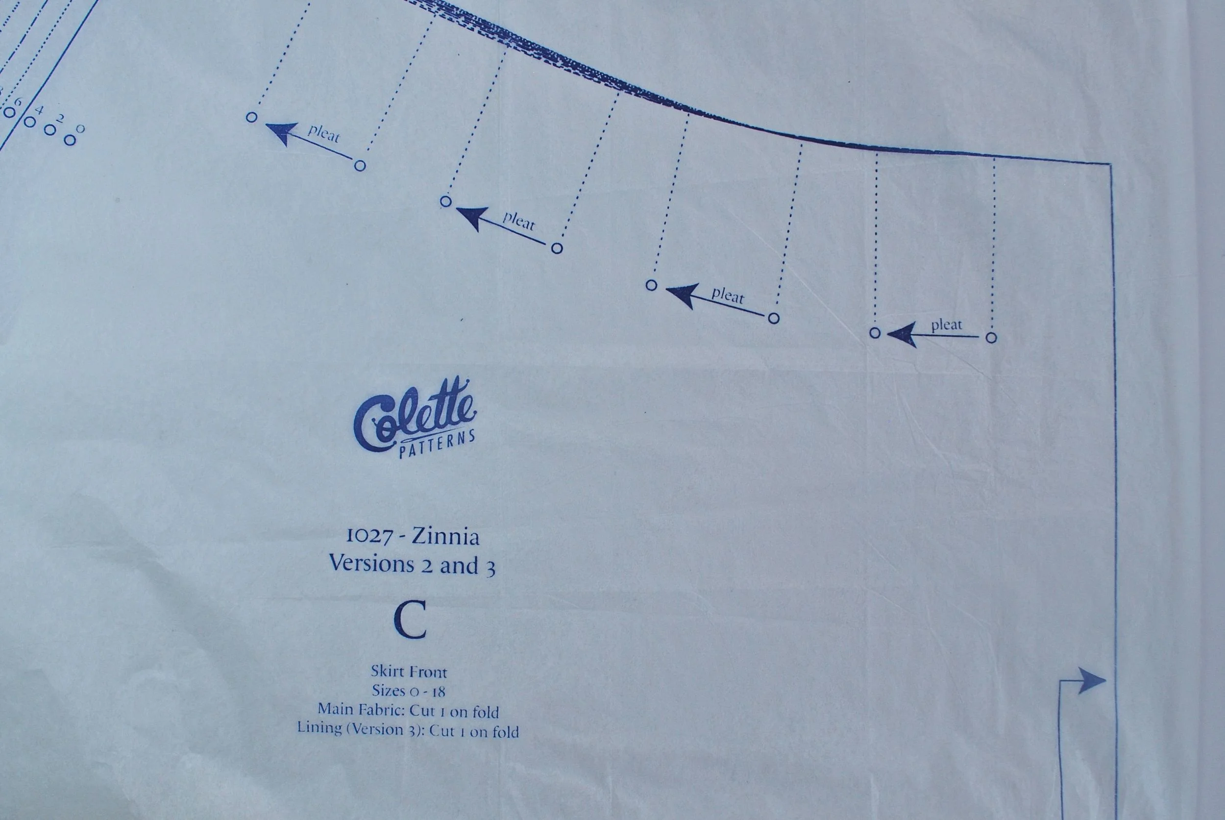 The arrows between the pleat lines show the direction in which they need to be pressed. 
