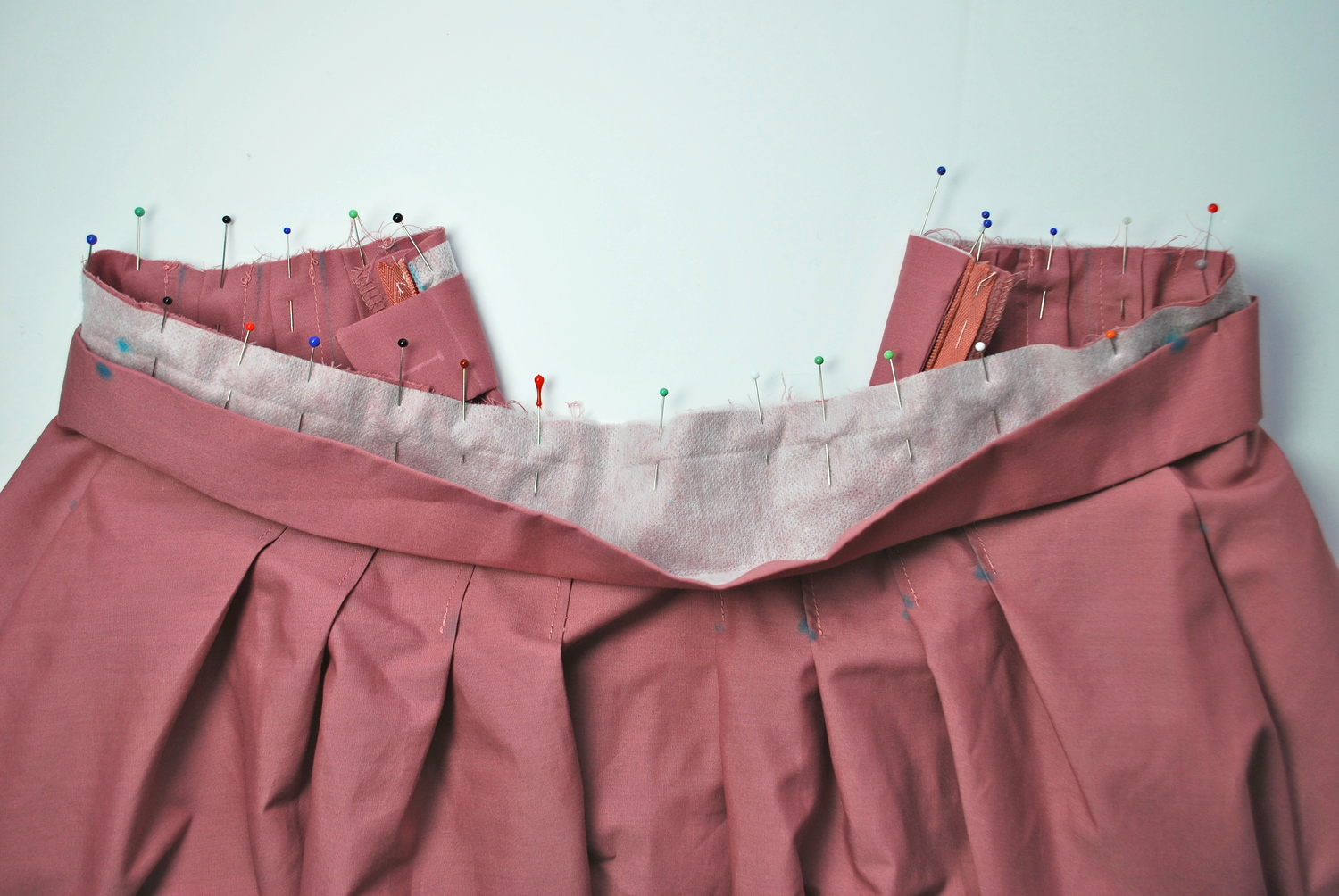 Waistband fully pinned to the skirt. 