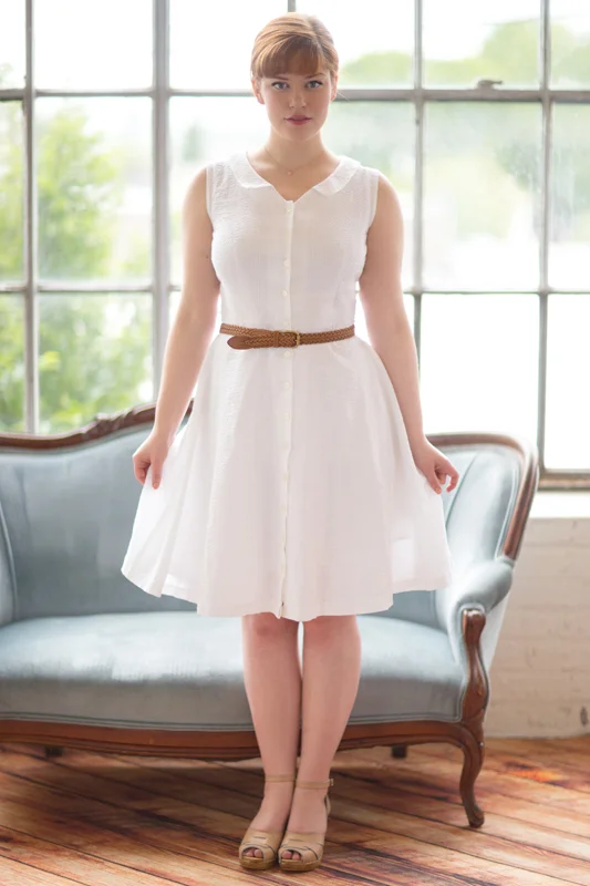 HAWTHORN Colette Turn heads in this curve-hugging classic that combines gamine styling with a flattering and feminine fit. Version 1 is a short sleeved peplum blouse, which pairs perfectly with a pencil skirt or our slim trouser. Version 2 has 3/4 length sleeves with a cuff and menswear-style placket. Version 3 is sleeveless, with armholes finished with bias tape inside. 