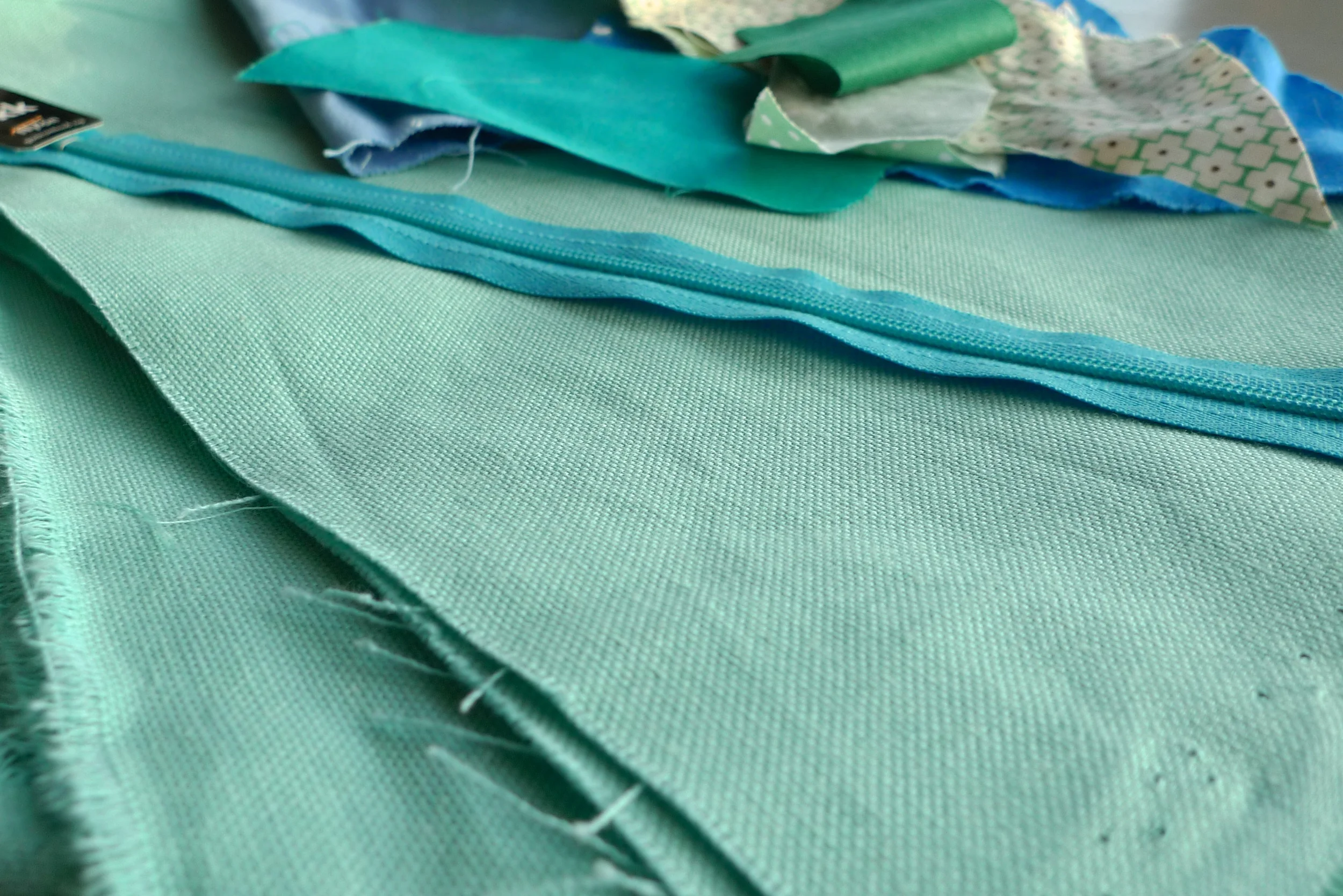 Turquoise fabric for my appliqué cushion.