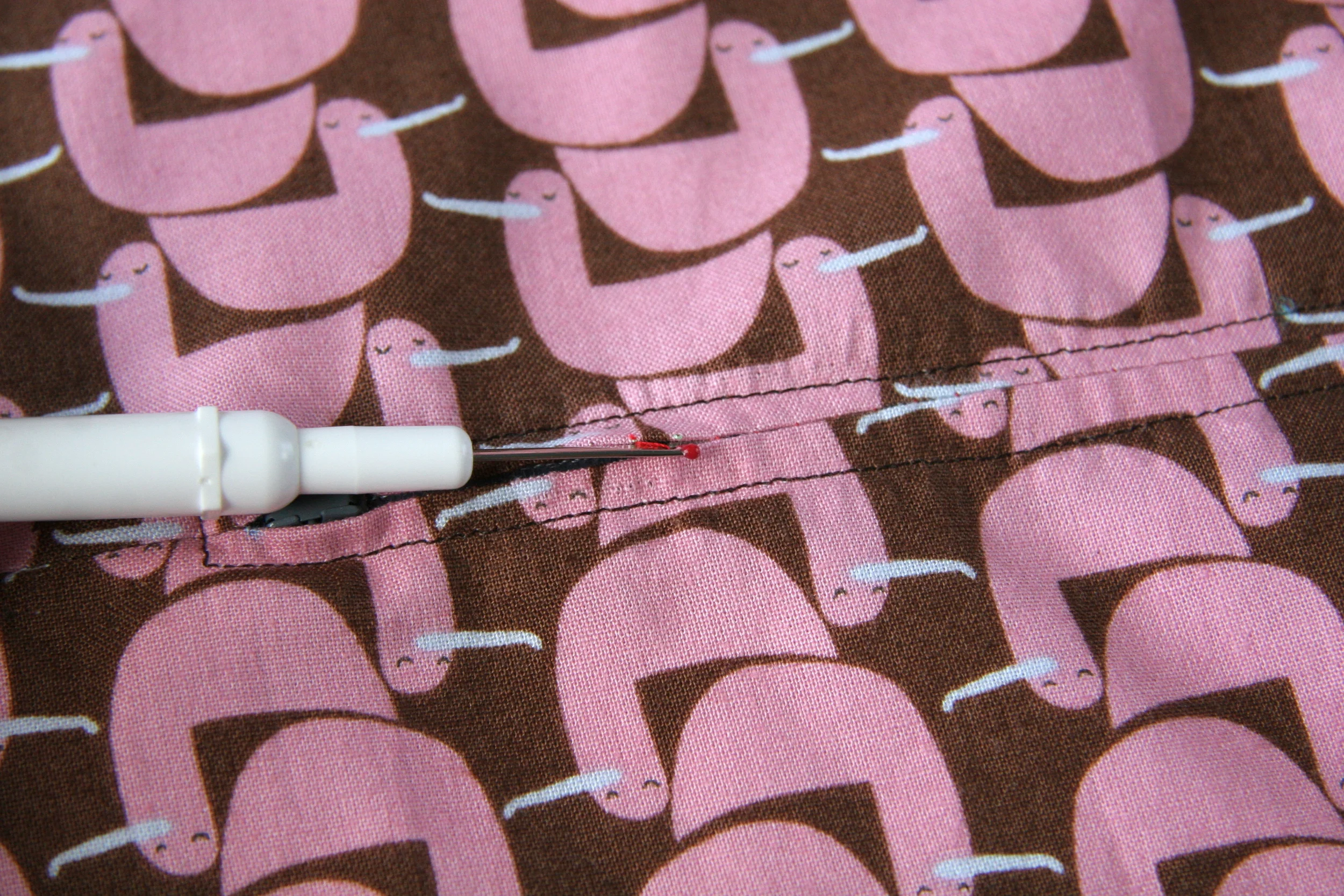 STEP 4f - Use a seam ripper to take out the basting stitches and open the seam