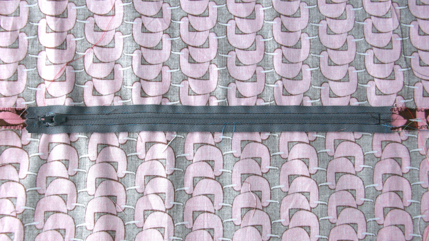 Zip sewn in, looking from the wrong side of the fabric