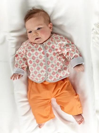 LULLABY LAYETTE by Oliver + S A unisex, four piece set of baby clothes for newborns. Students will focus on one piece, with the option to make more if time permits.
