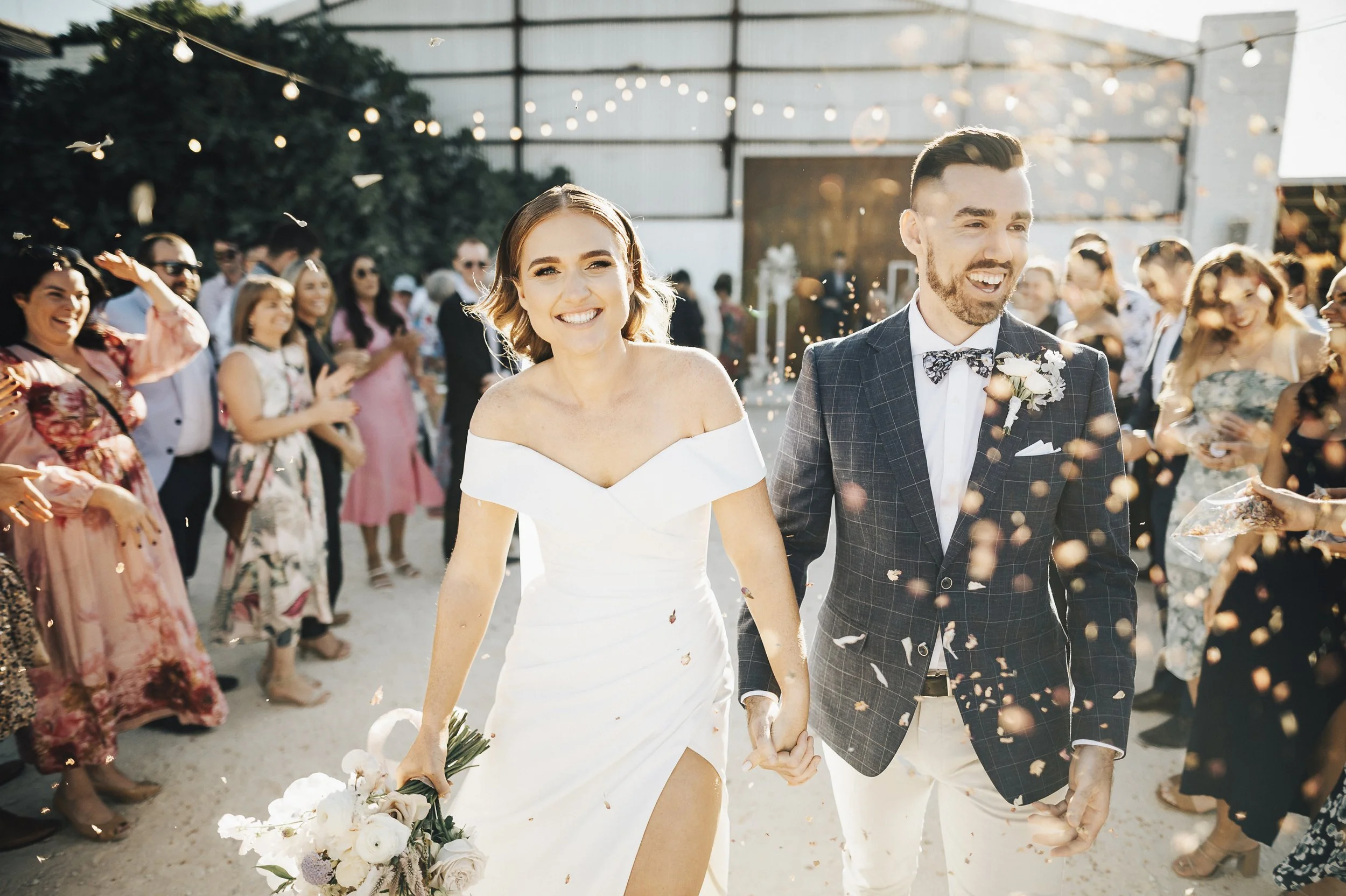 Officially official! Congratulations to the happy couple on their beautiful, confetti-filled exit at Assembly Yard.