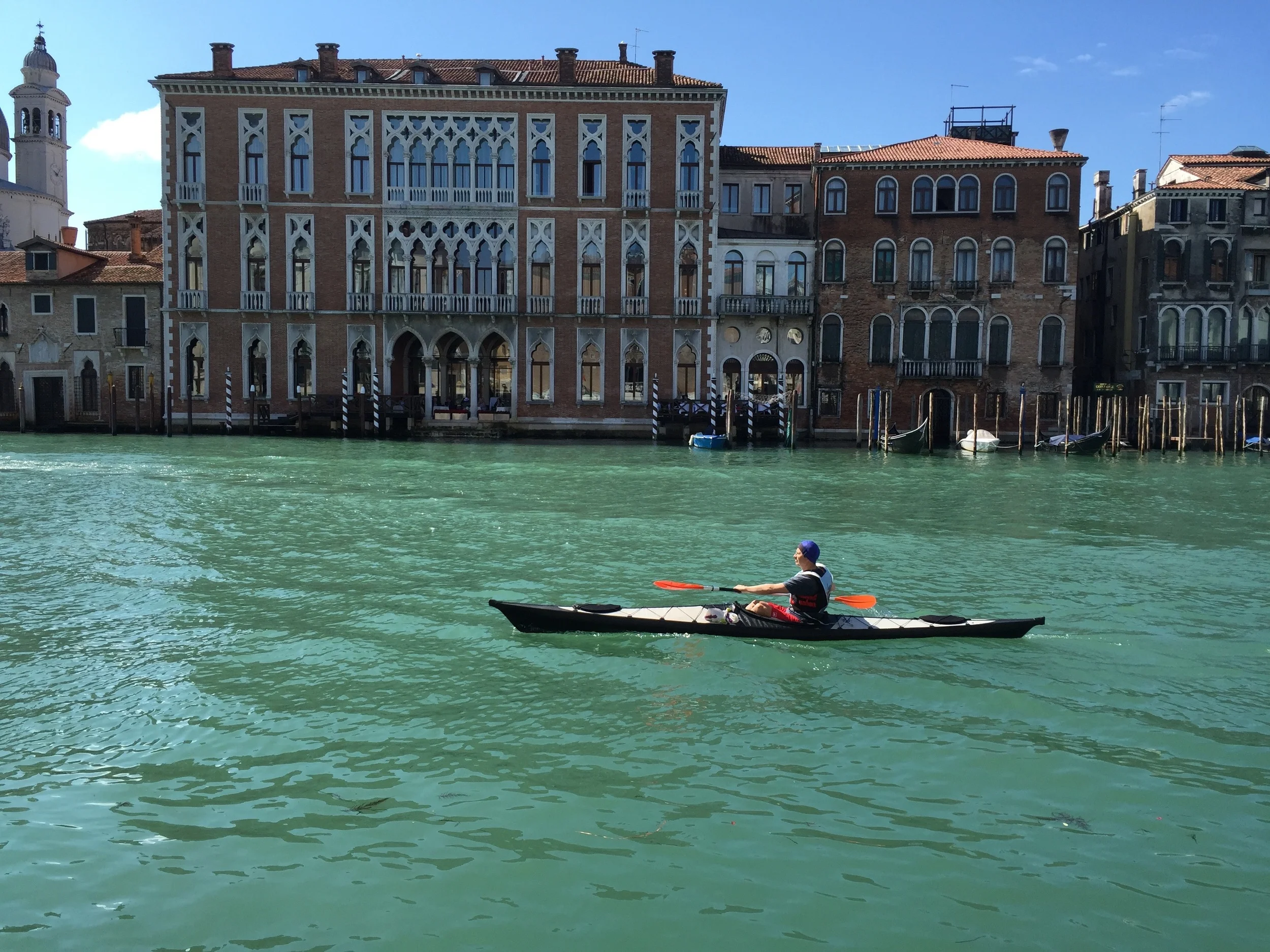Watching other people exercise at La Vogalonga, Venice's famous boat race.