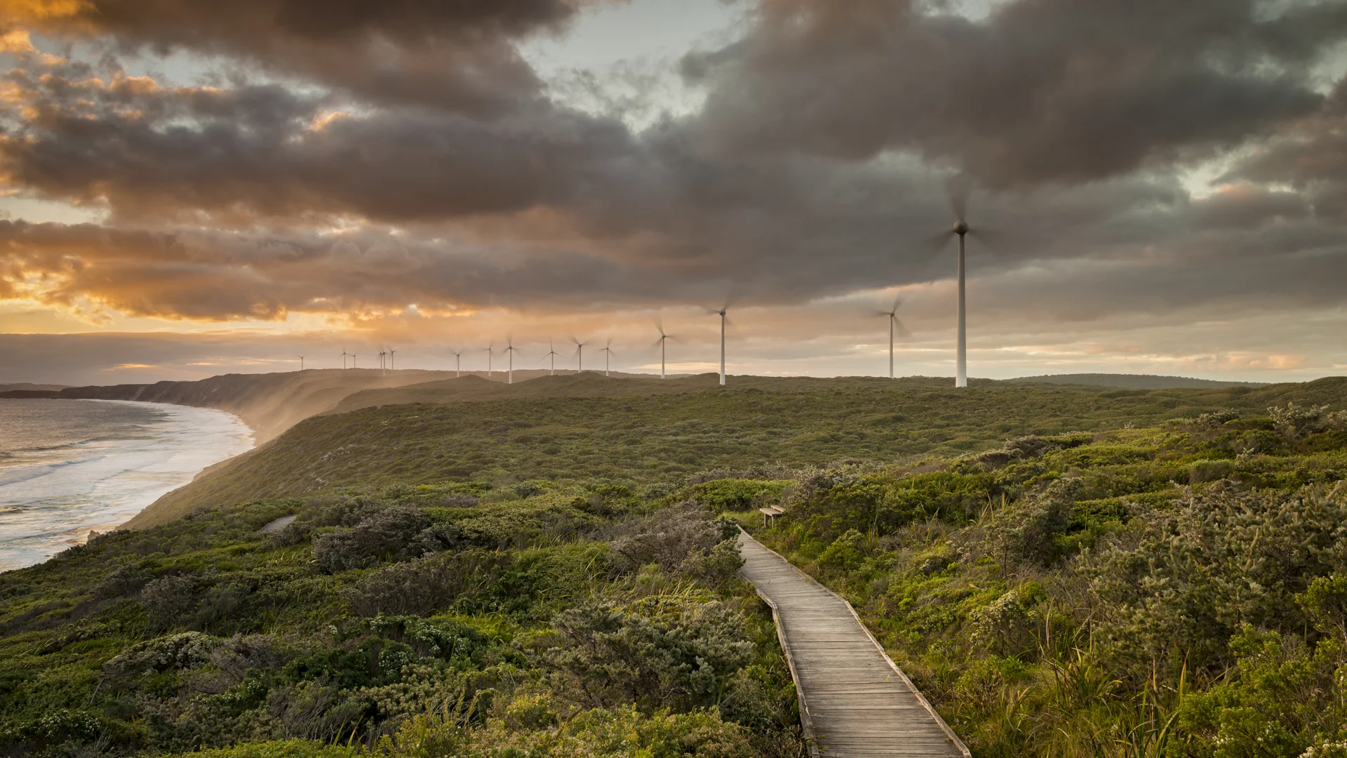 Sunset over the cliffs at Albany Windfarm