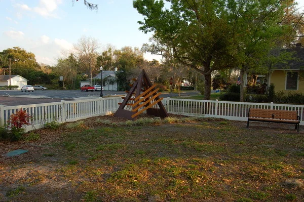 The diagonal slats mirror the picket fence