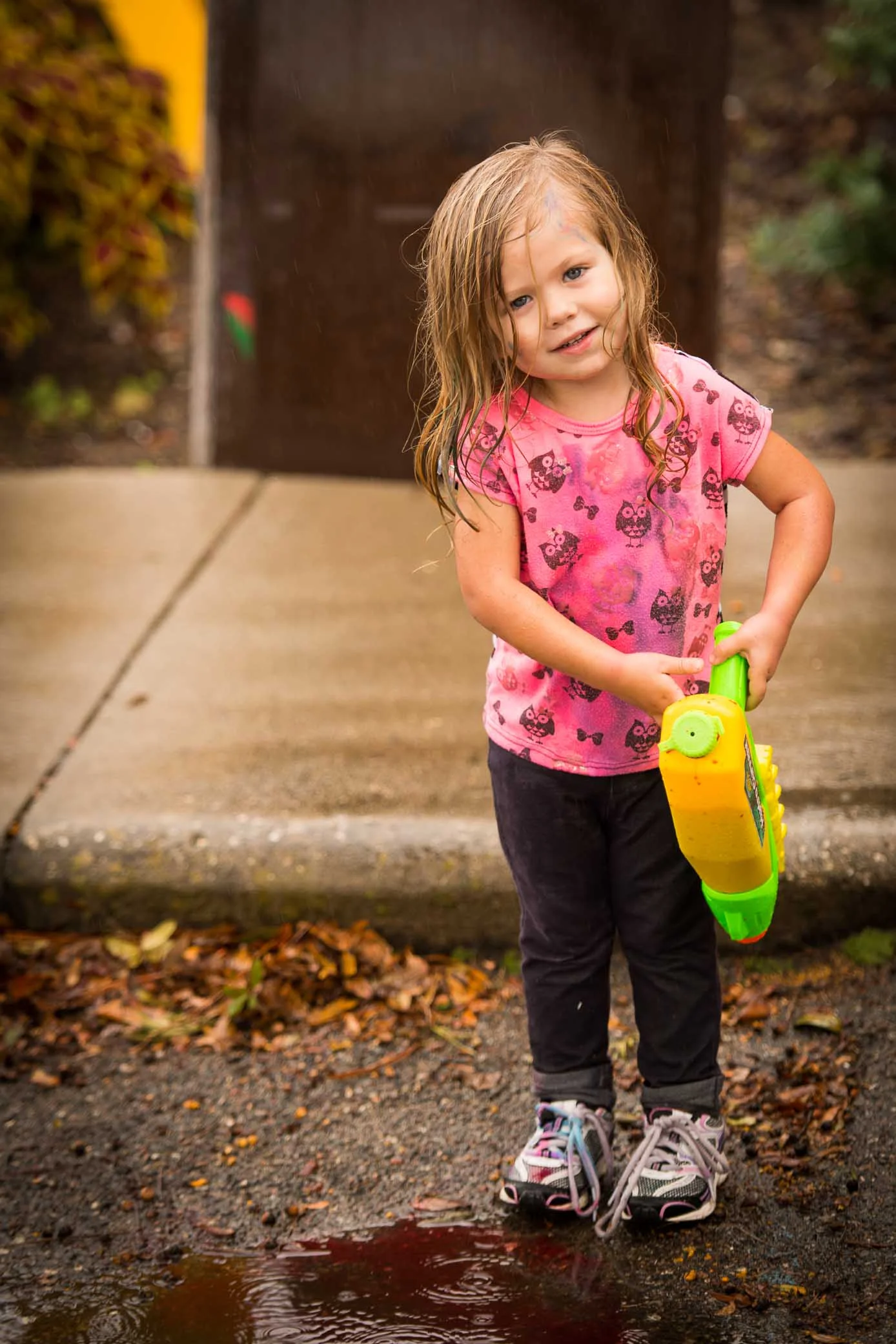 Girl Playing in the Rain