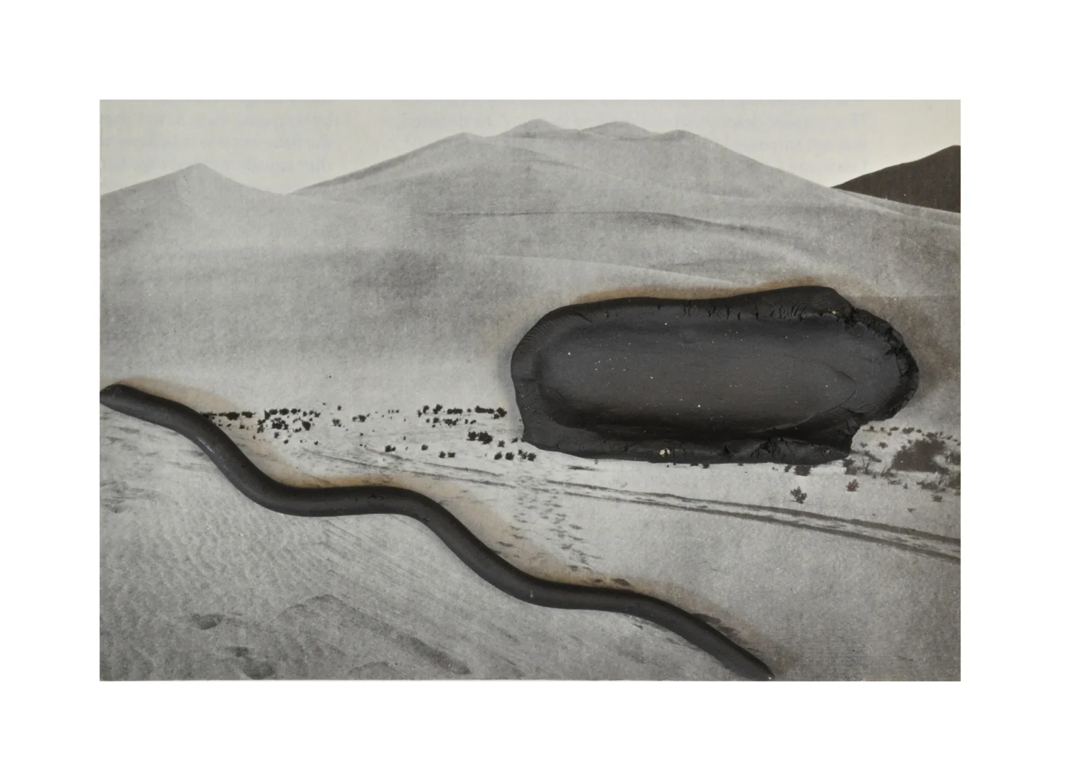   The Country Belonged to God   Found image and black stoneware. 2014 