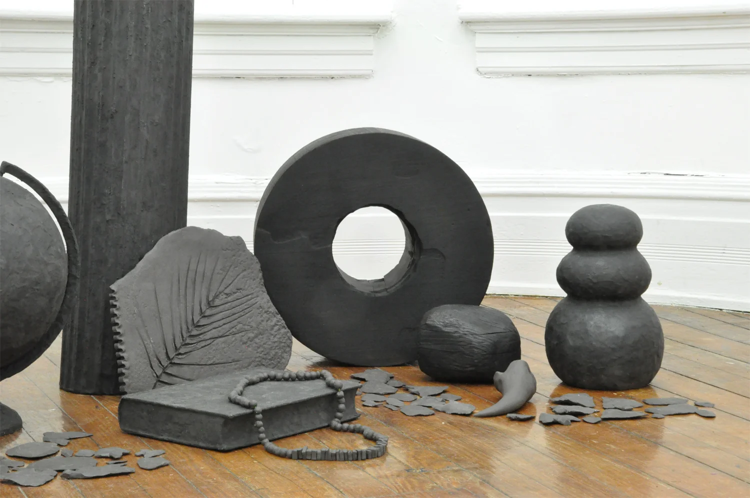  Something Ancient.&nbsp;   Black stoneware, Magic Sculp, wood, stain. Made in collaboration&nbsp;with Lindsey Dezman. 2015&nbsp; 