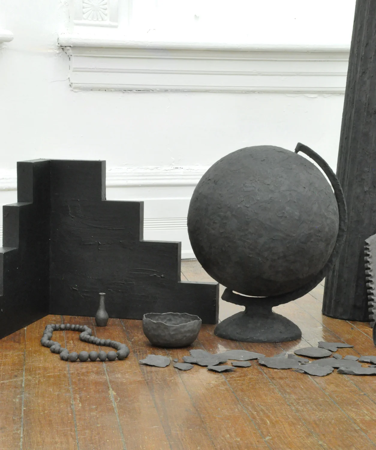   Something Ancient.&nbsp;   Black stoneware, Magic Sculp, wood, stain. Made in collaboration&nbsp;with Lindsey Dezman. 2015&nbsp; 
