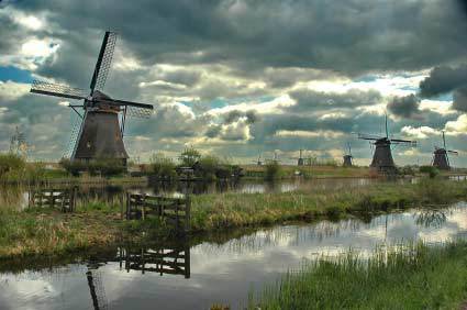 Windmills in Holland before a storm.