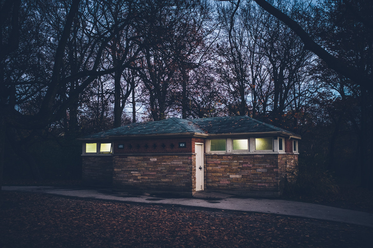 Washrooms in High Park. I love the way the diffused glass windows make this little building glow at dusk.
