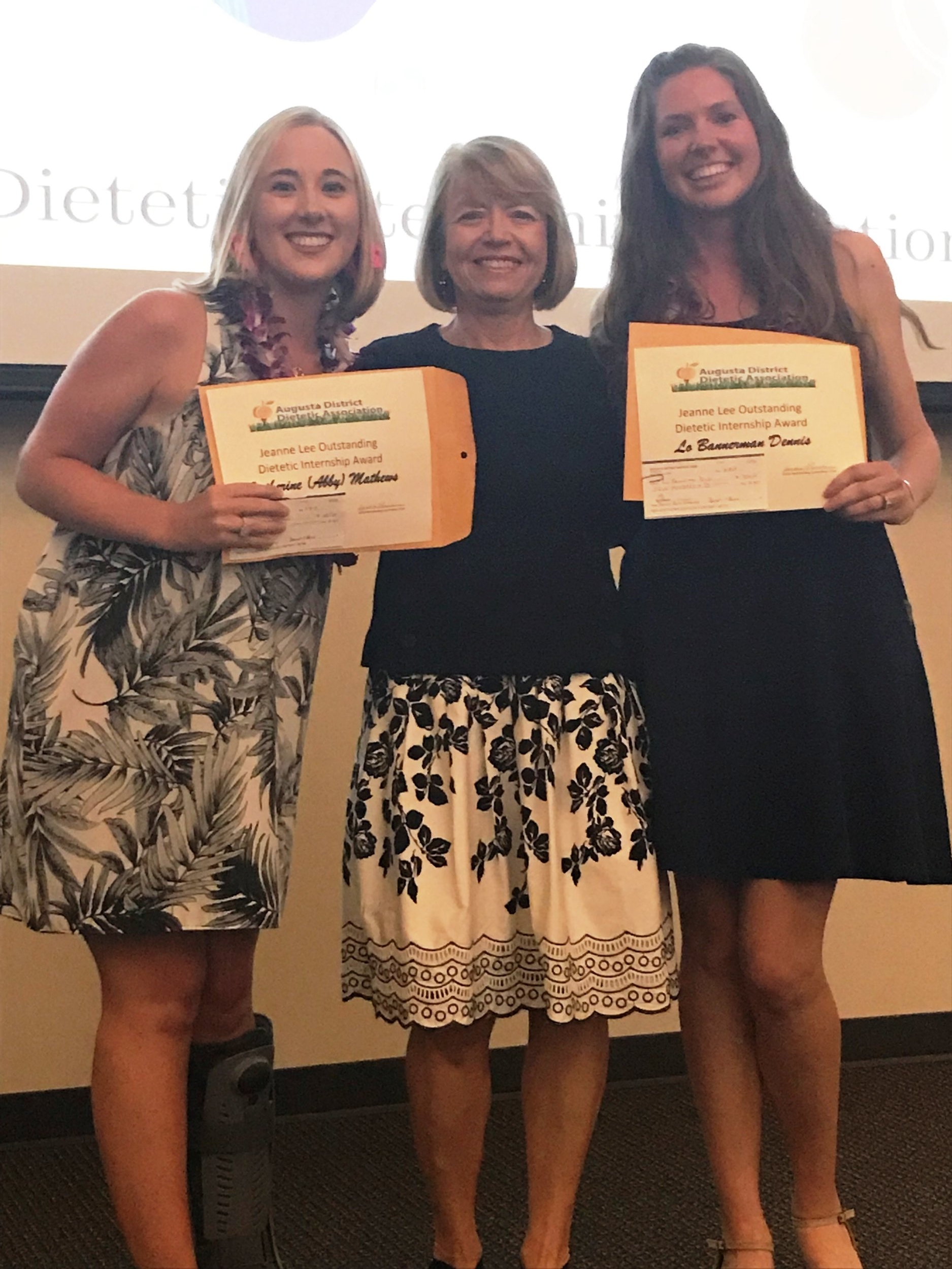 Award recipients Abby Mathews (left) and Lo Bannerman (right) with ADDA's Nominating Committee Chair, Sandy Loushine (middle).