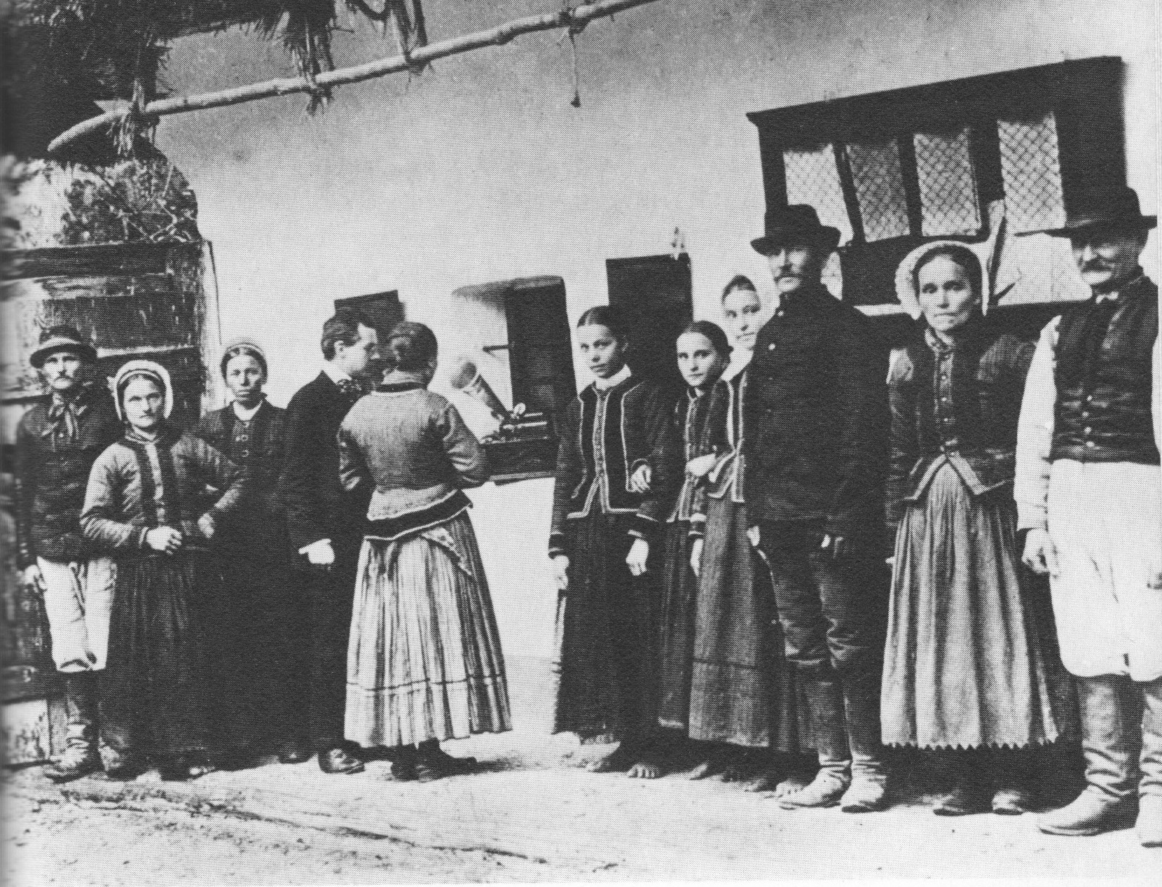 Bela Bartok using a gramaphone to record folk songs sung by Czech peasants , Photographer unknown, Public Domain