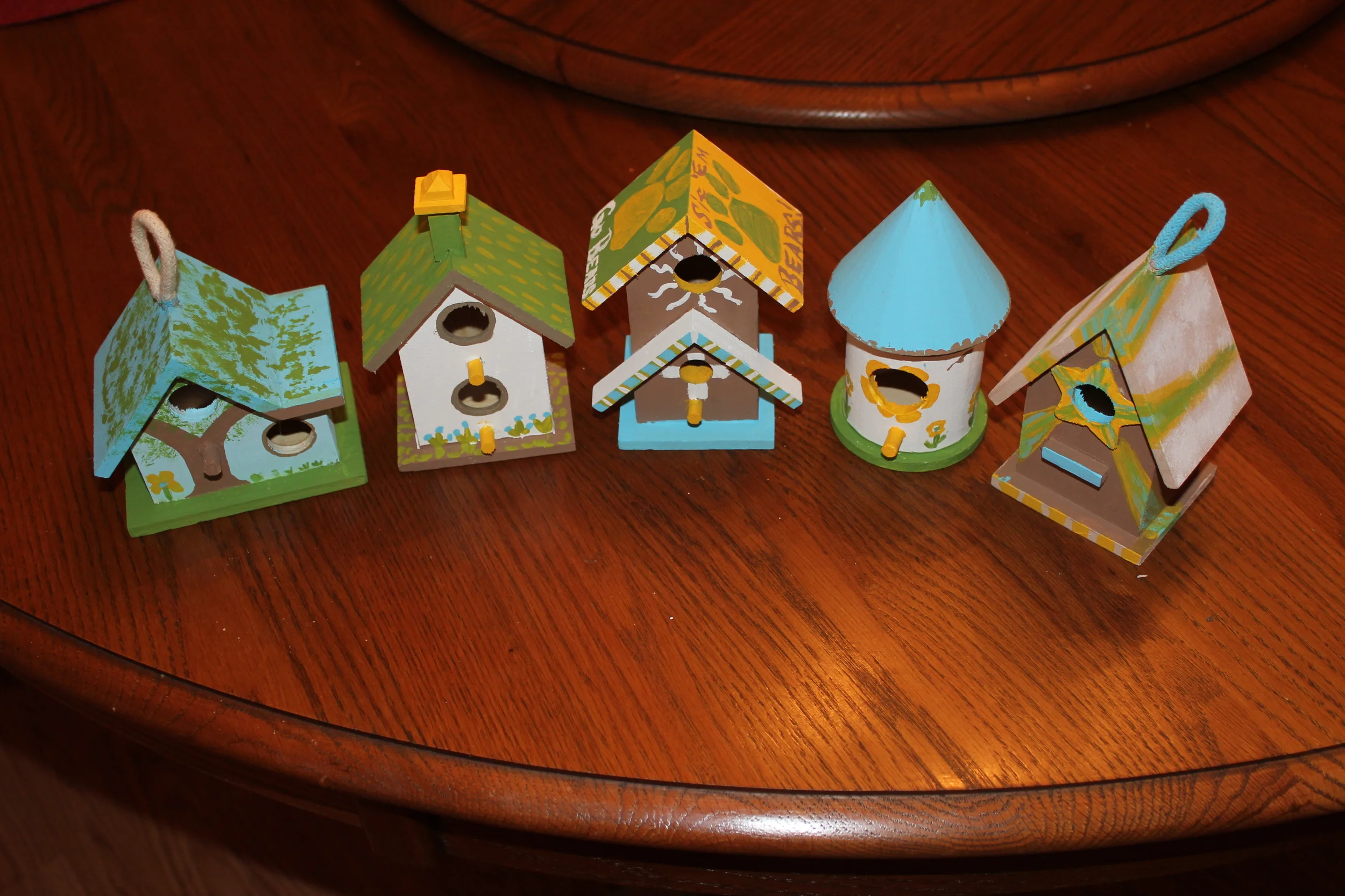 Contest of the Week - 5 colors, one birdhouse per adult, best wins. I came in....last. Hey, my family is creative!