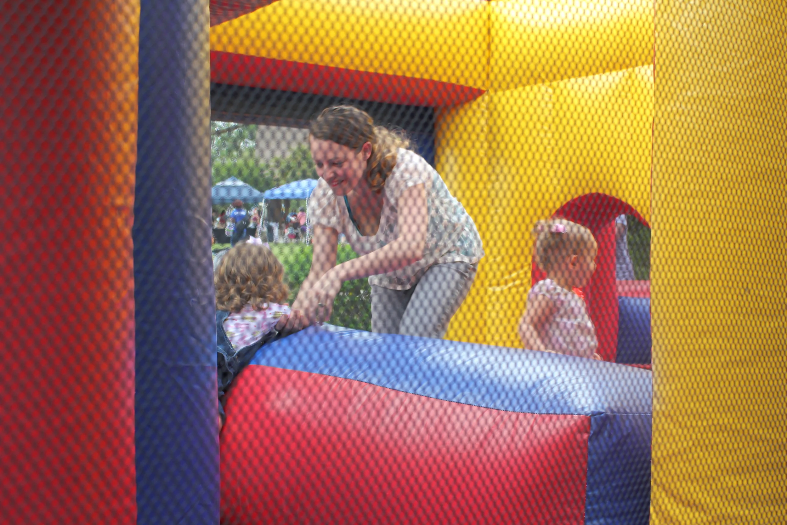 Avi, me, and Kenzie in the bounce house.