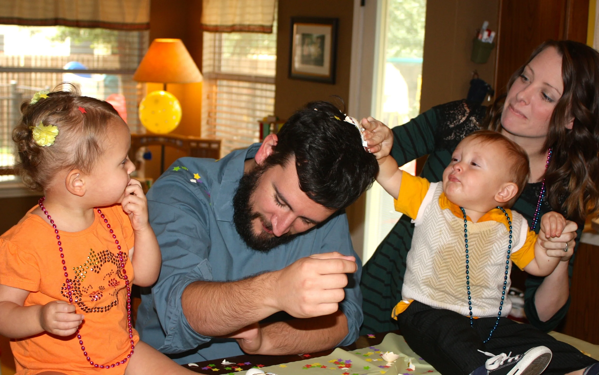 Kenzie and Judah cracked the confetti eggs on Joshua's head...one at a time!