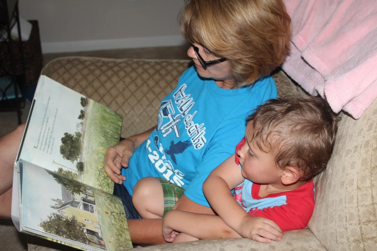 Mom and Judah reading The Other Side