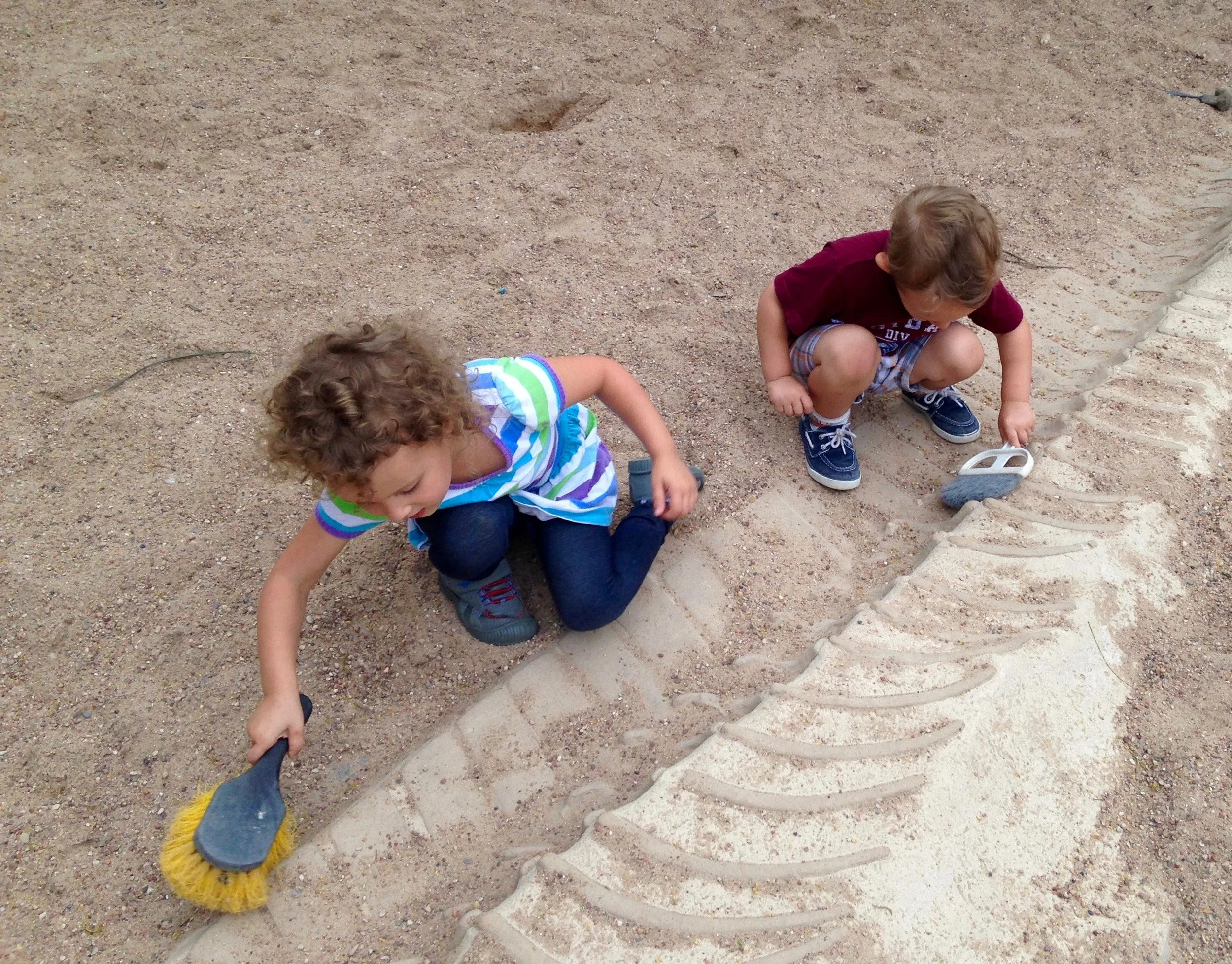 Kenzie & Judah digging for dinosaur bones at the Austin Nature & Science Center - a free resource here in the city. 