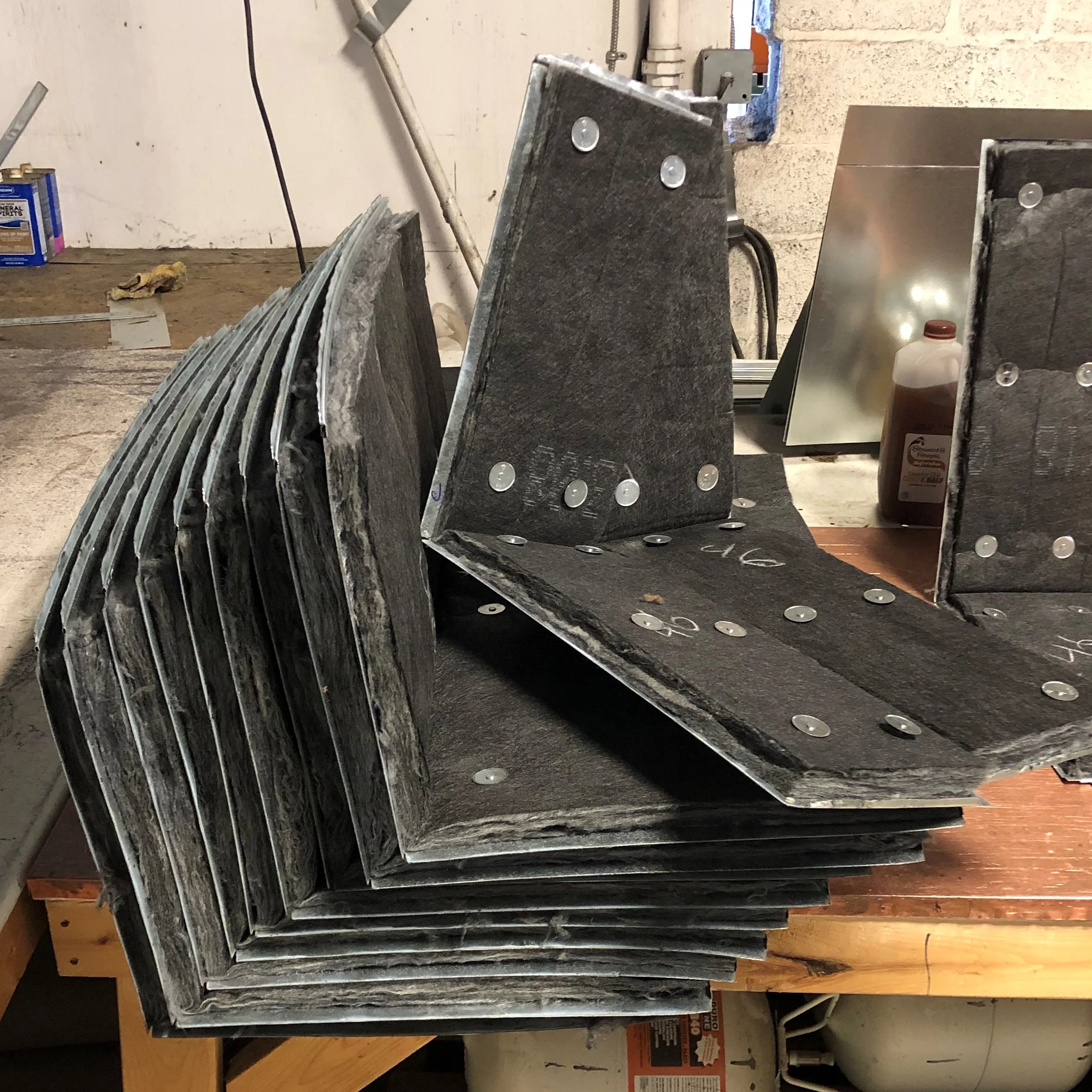 Plenums and Sleeves in multiple stages of the lining process