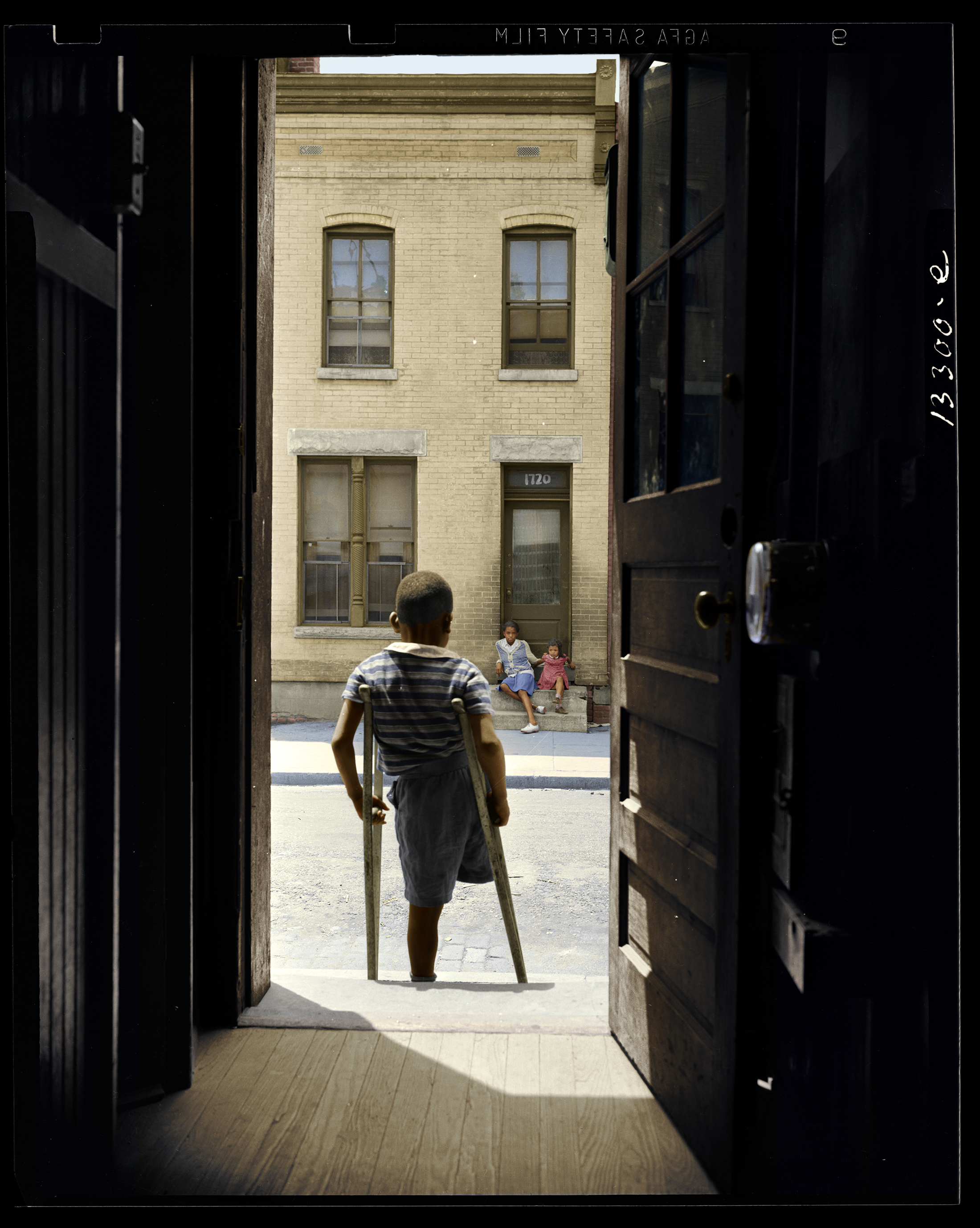 Young Boy in Door Frame, Washington DC, 1942