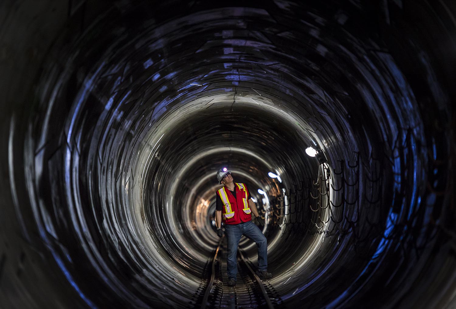 Tim Langmaid project manager for Hatch MacDonald inspects 3.5 metre-wide tunnel, located 30 metres below the river bed between Surrey and Port Coquitlam September 10, 2015. This is Metro Vancouver’s most-complicated Water Services projects and recently reached a milestone the tunnelling deep below the Fraser River is now complete for the new Port Mann water main. (John Lehmann/The Globe and Mail)