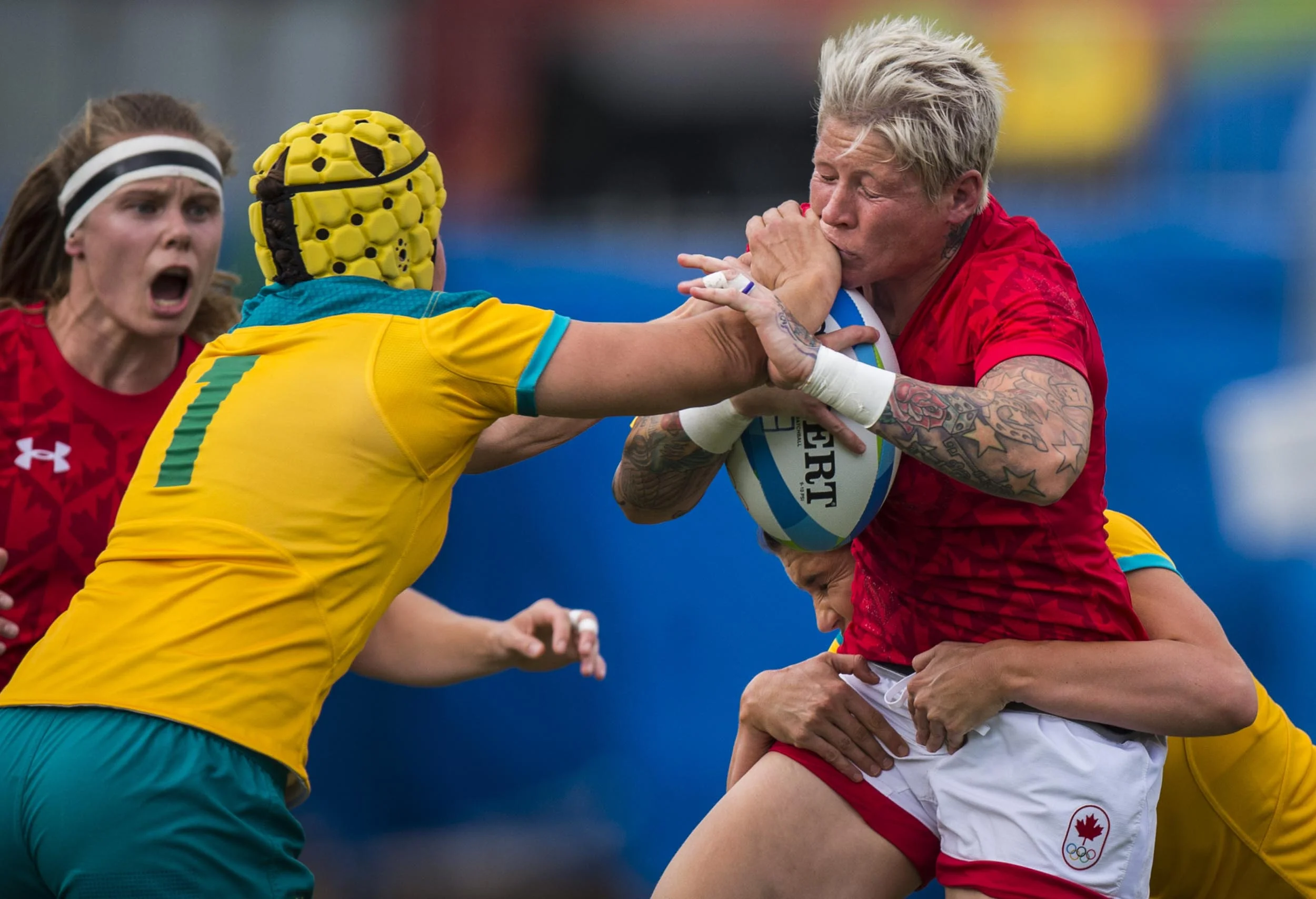 Canadian player Jennifer Kish is tackled during the semi-final match at Deodoro Stadium at Rio Olympics August 8, 2016. (John Lehmann/The Globe and Mail)