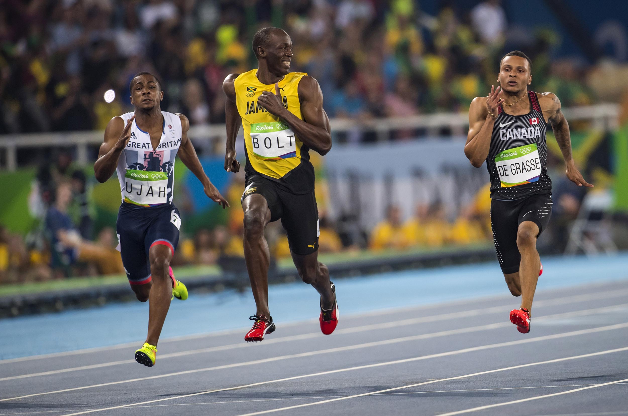 Great Britons Chijindu Ujah, Jamaican Usain Bolt and Canadian Andre De Grasse in the men's final 100m race during Rio Olympics August 14, 2016. (John Lehmann/The Globe and Mail)