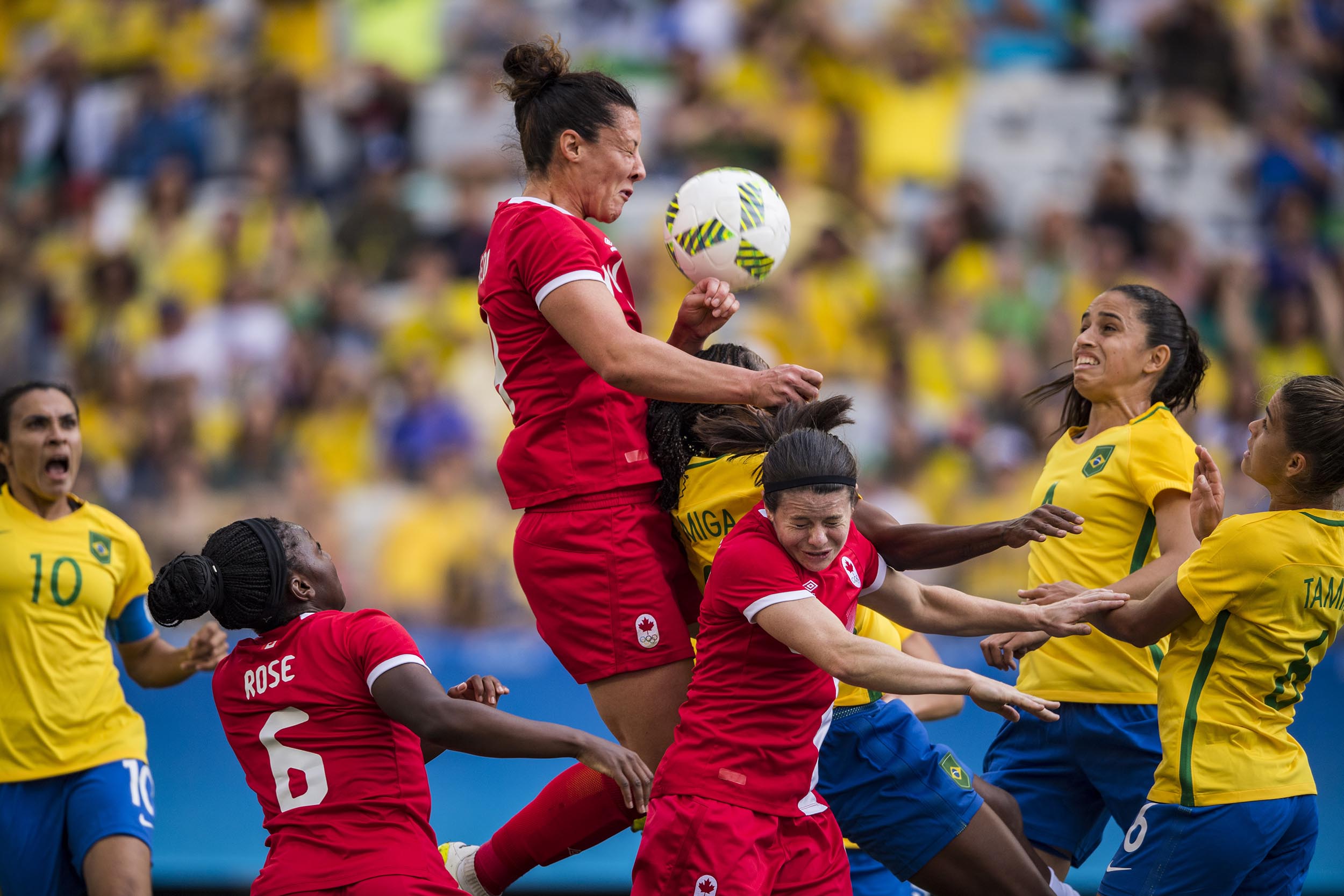 Team Canada and Team Brazil fight for control of the ball during the bronze medal match in Sao Paulo August 19, 2016 at the Rio 2016 Summer Olympics. (John Lehmann/The Globe and Mail)