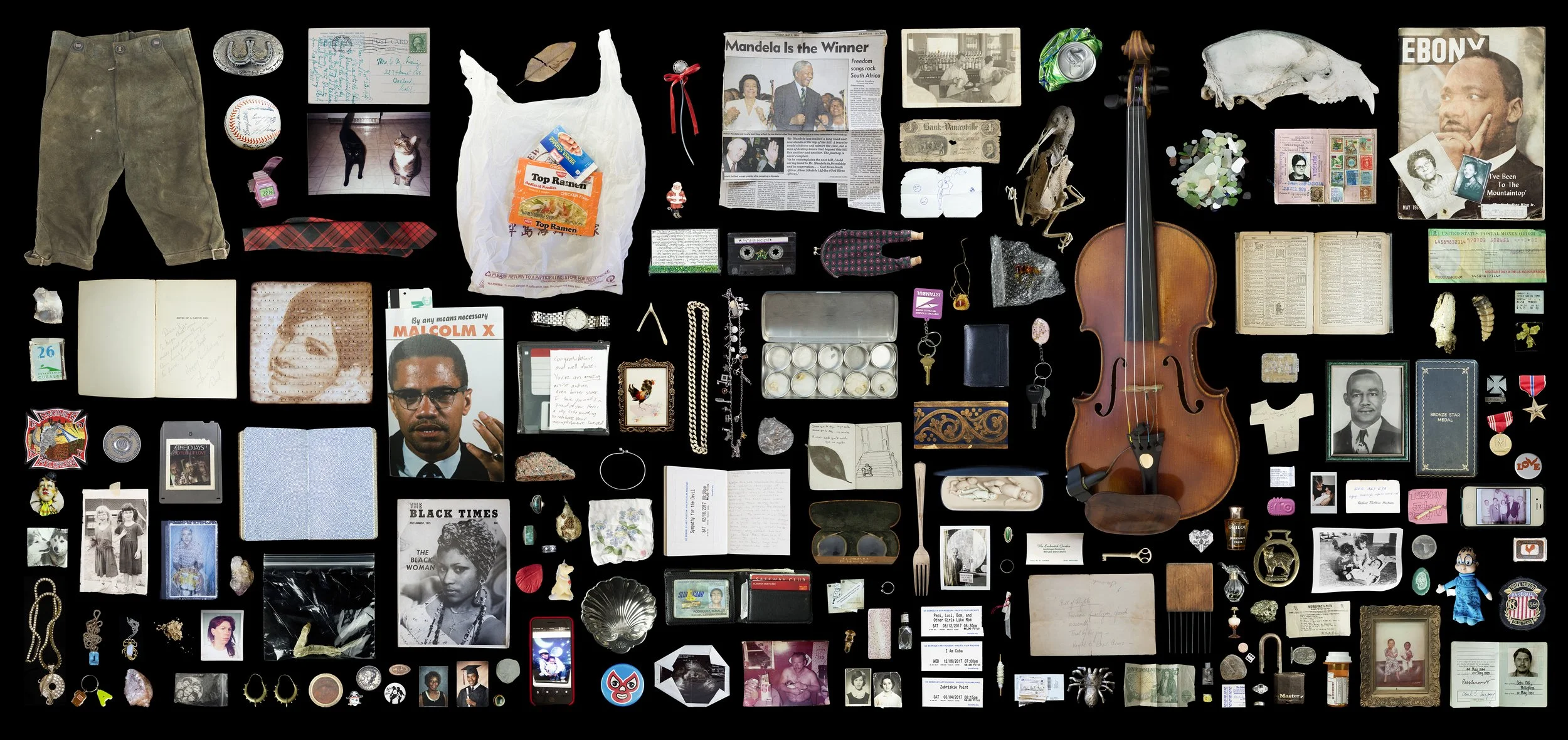 A collage of various personal items including clothing, photographs, jewelry, books, a violin, a newspaper, a wallet, medication, keys, and memorabilia arranged on a black background.