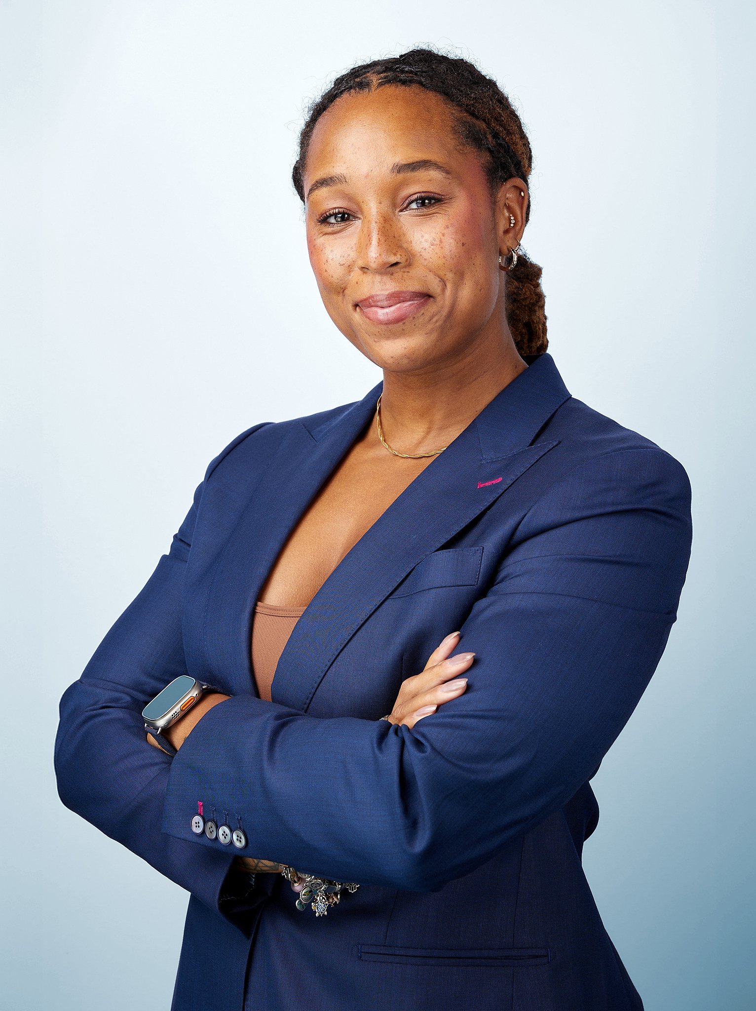 business-portrait-austin-texas-woman-navy-suit-arms-crossed.jpg