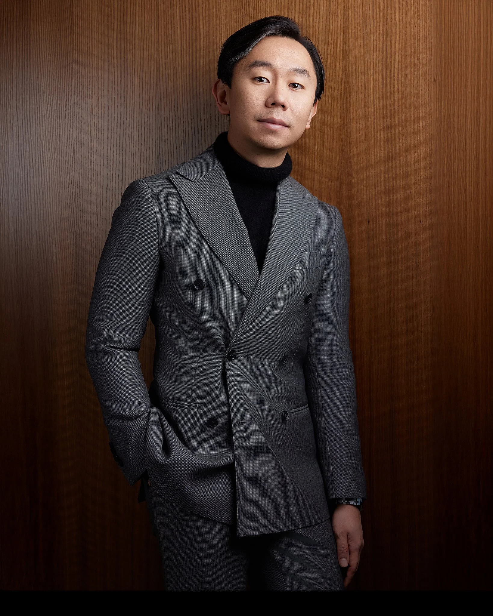 austin-headshot-photographer-man-gray-suit-wood-backdrop-2.jpg