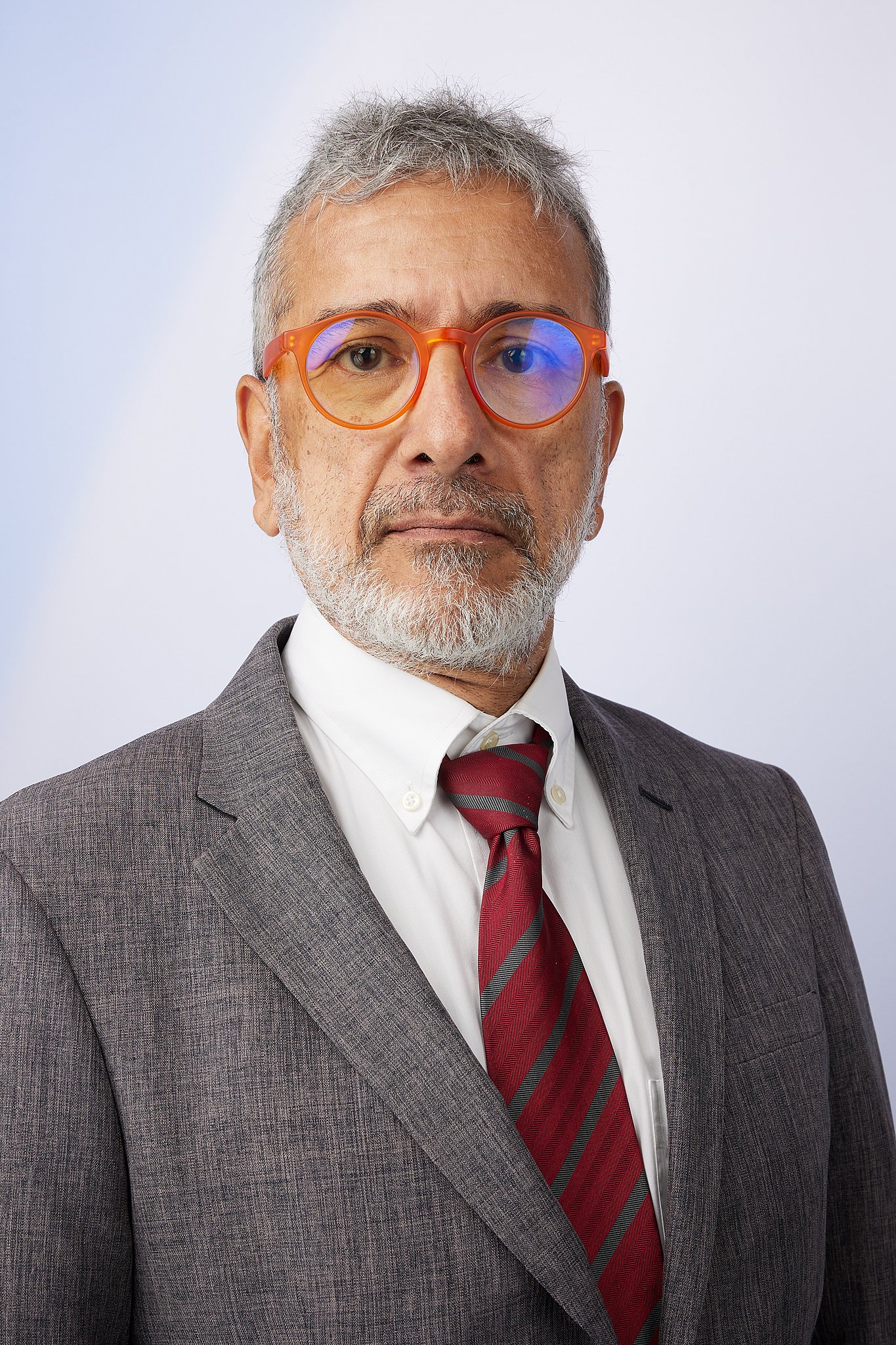 executive-portrait-austin-tx-man-gray-suit-red-tie-glasses.jpg