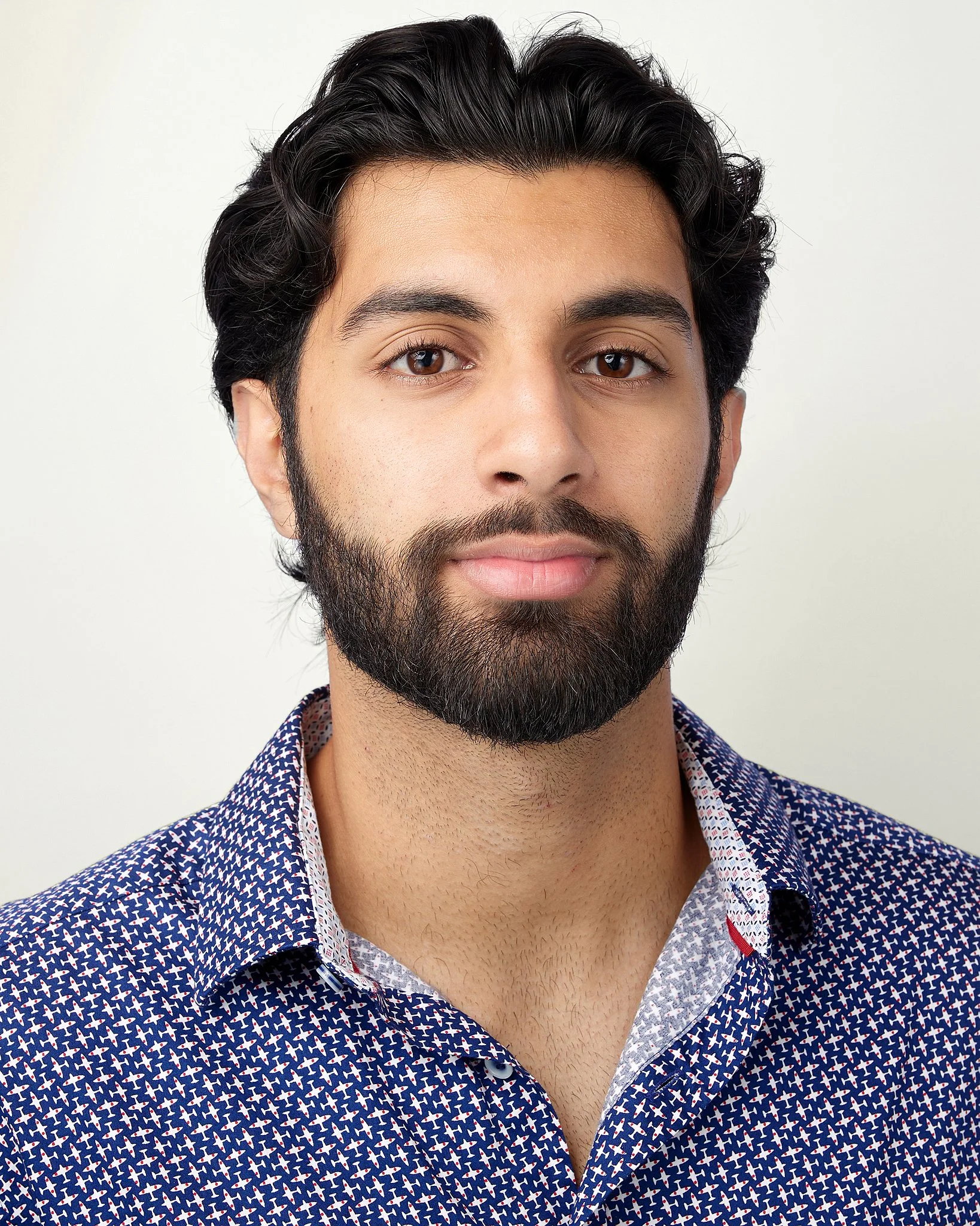 professional-headshot-austin-tx-bearded-man-patterned-shirt.jpg