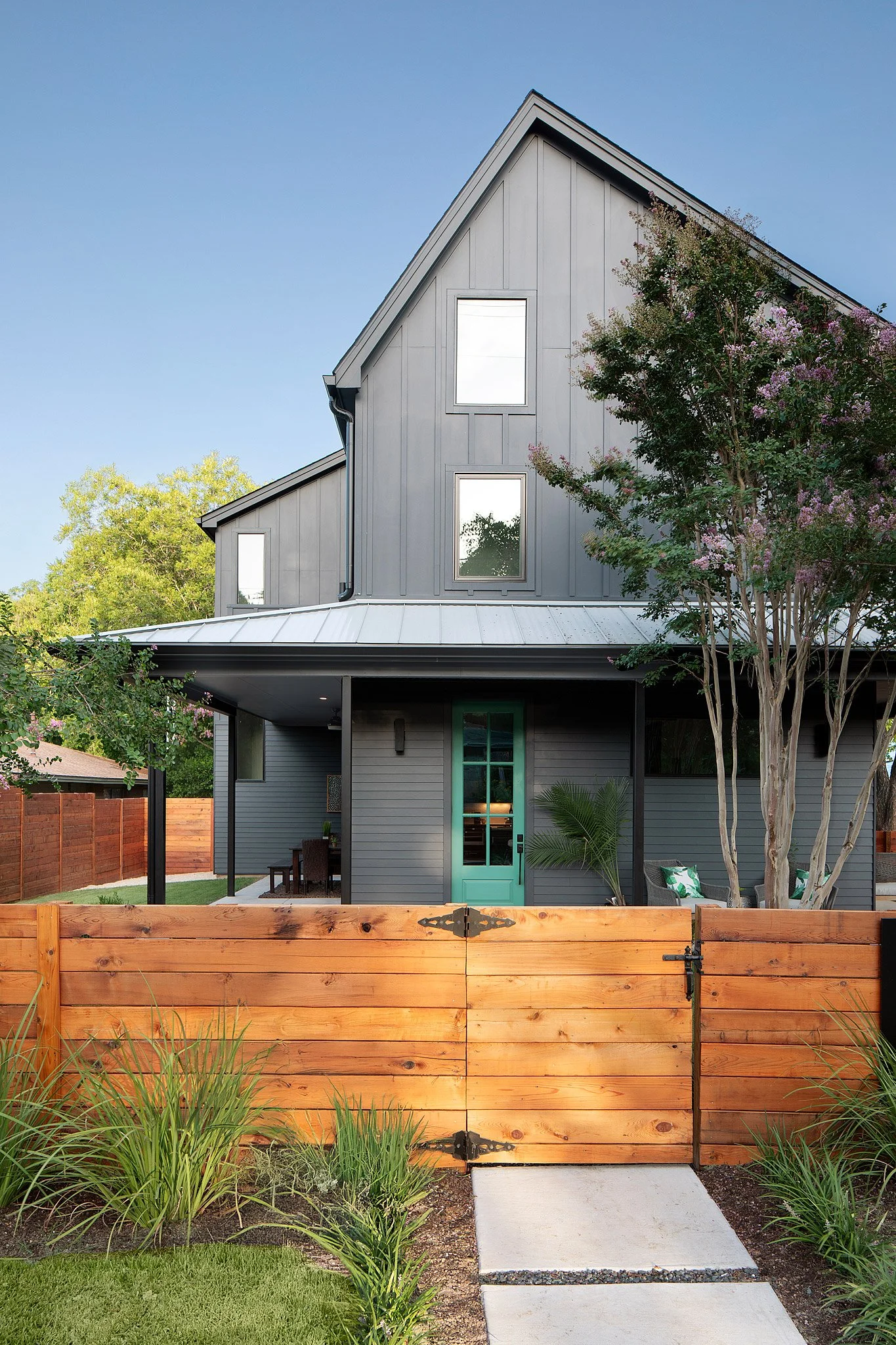 modern-farmhouse-exterior-white-board-batten-austin-architecture.jpg