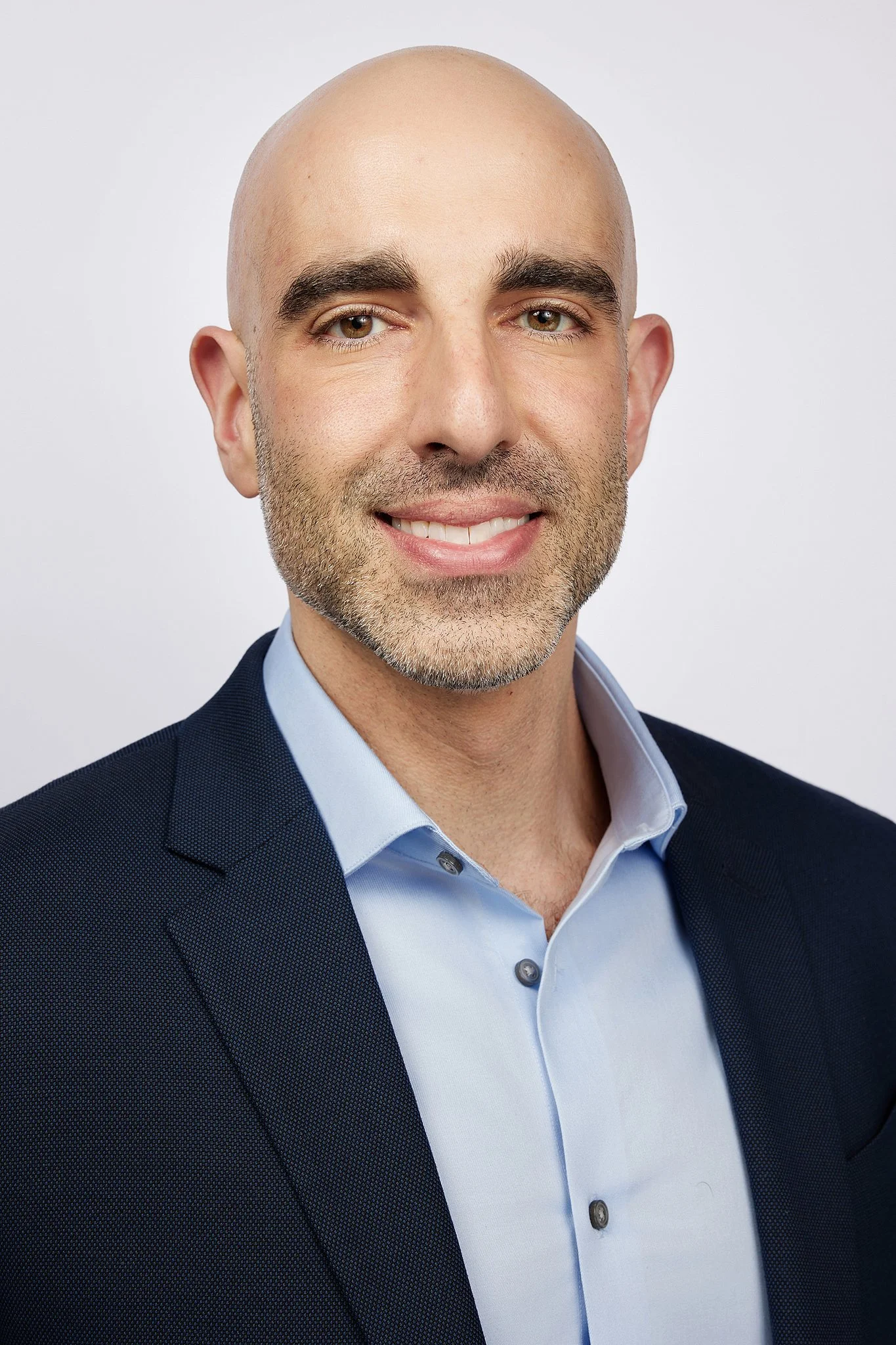 corporate-headshot-austin-man-navy-suit-light-blue-shirt.jpg