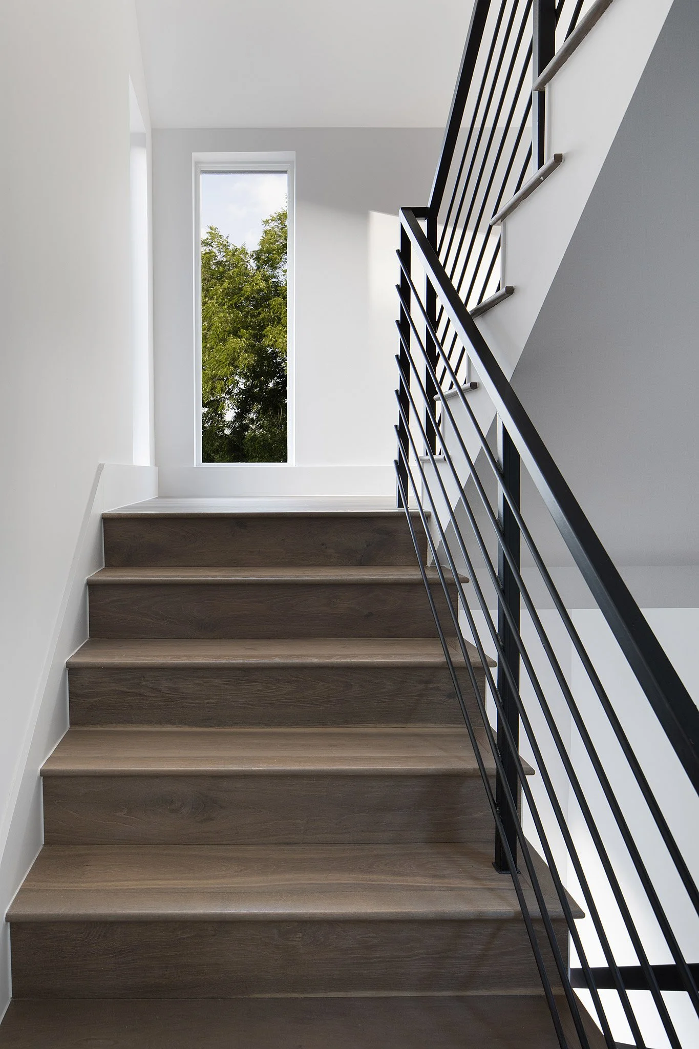 modern-staircase-metal-railings-austin-residential-architecture.jpg