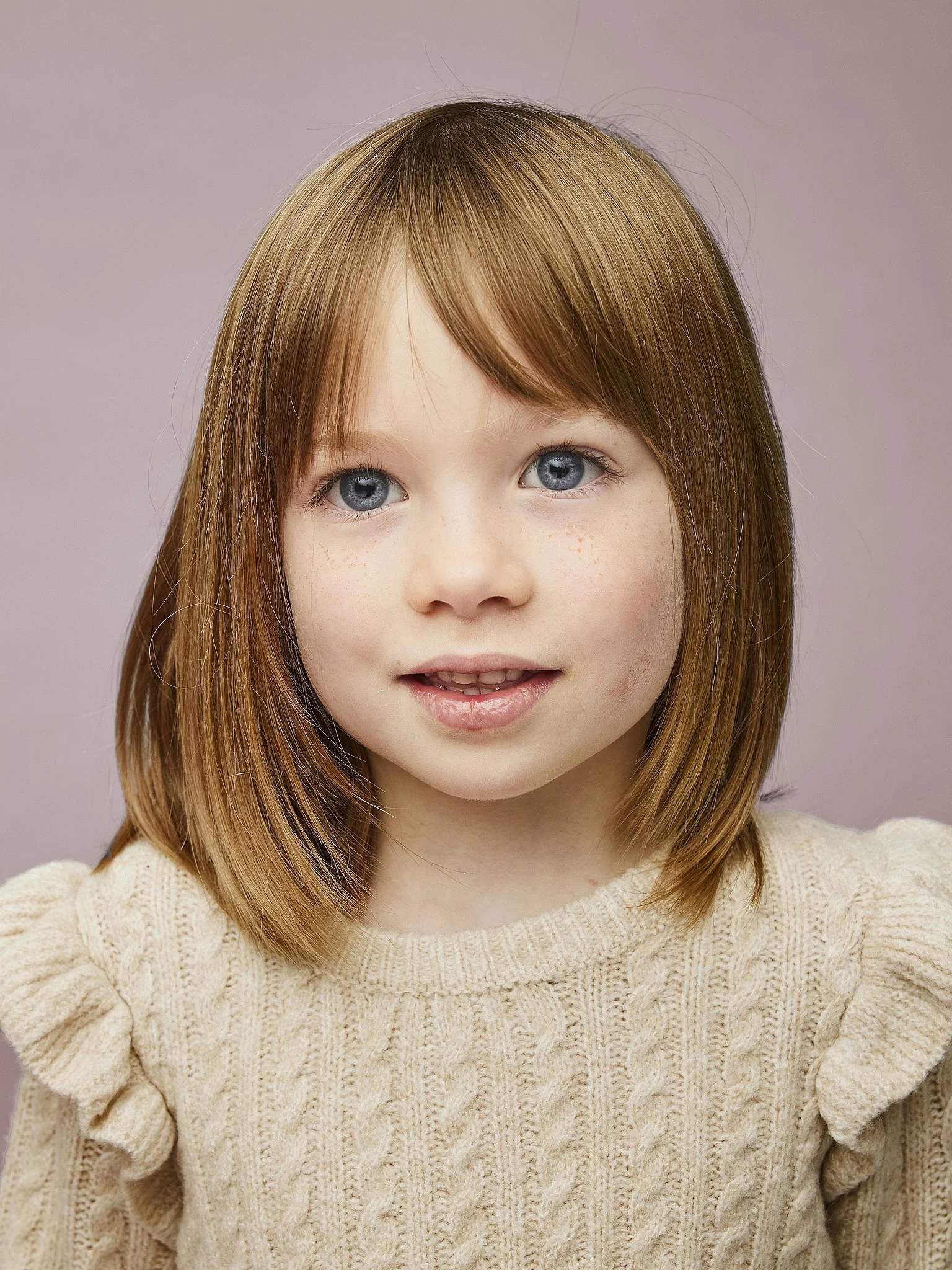 kids-portrait-photographer-austin-tx-girl-cream-sweater.jpg