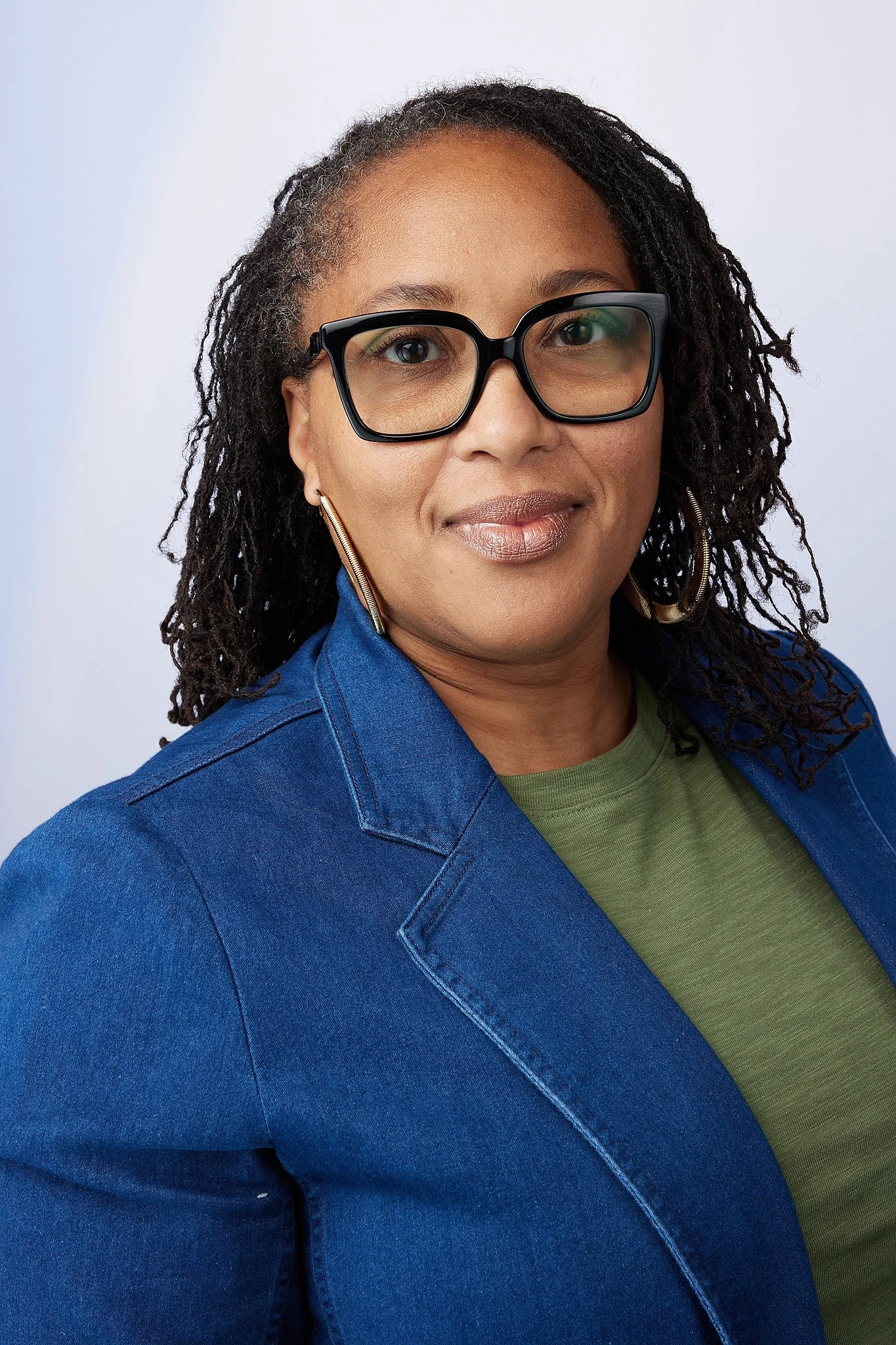 professional-headshot-austin-woman-denim-blazer-glasses.jpg