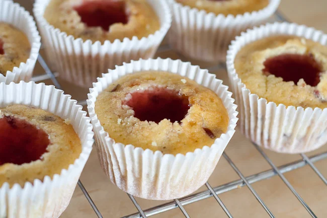 Cosmopolitan jelly shots poured into chilled cupcakes