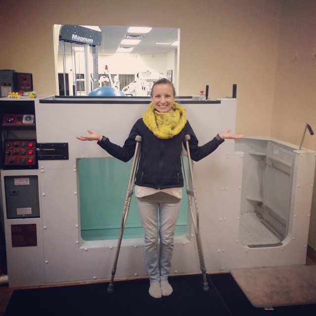 Finally up on crutches, with the help of the underwater treadmill!