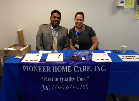 Chris Kovoor and Ebony Soto representing Pioneer Home Care, Inc. at the Job and Transition Fair