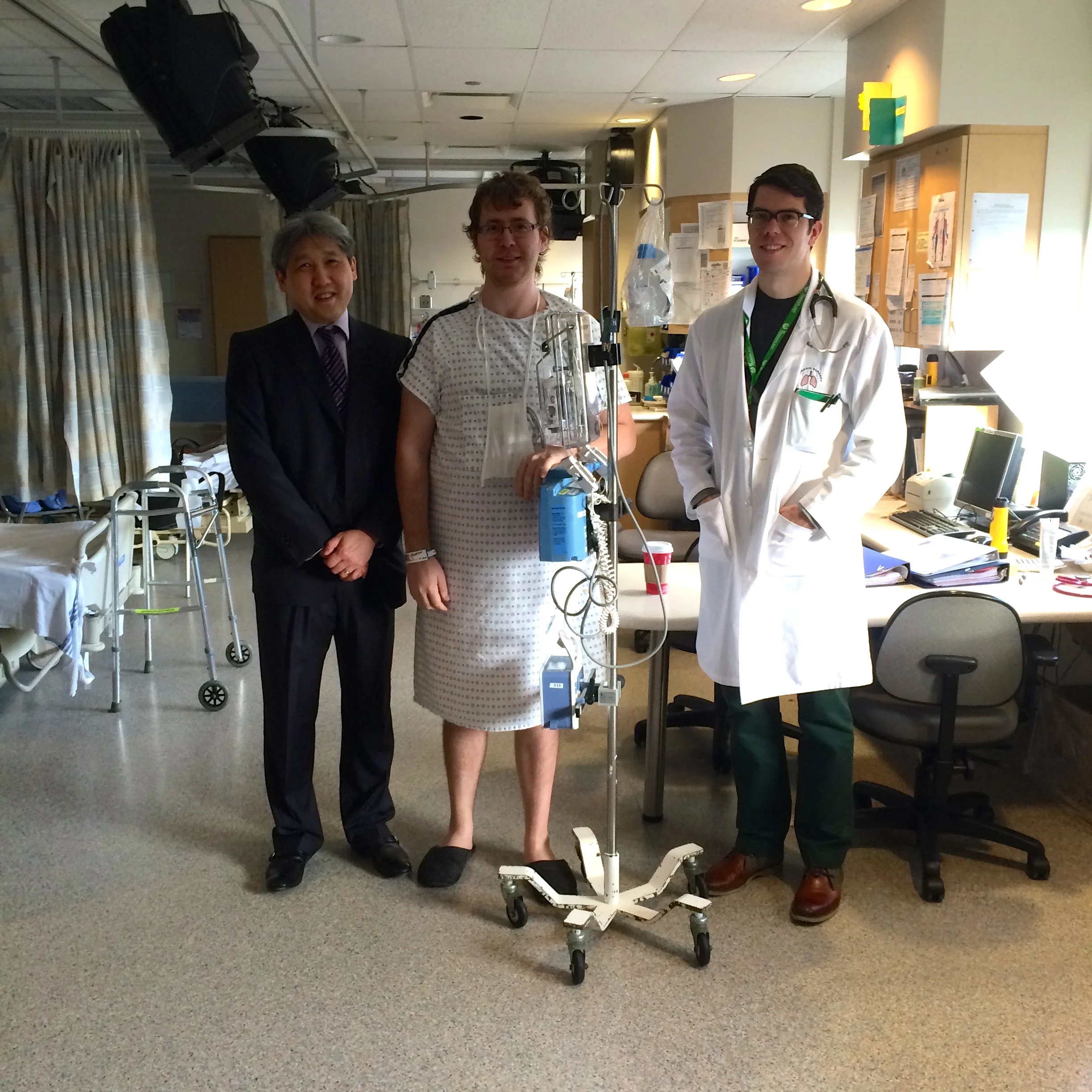 December 2014 - Alex had two lung surgeries. The gentleman To Alex’s right is Dr. John Yee, Alex’s thoracic surgeon. Dr. Yee has just told Alex that he is being released from hospital.