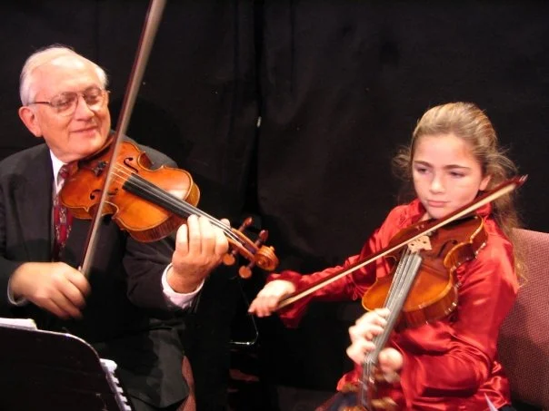 Dr. John Enyart and His Granddaughter Performing